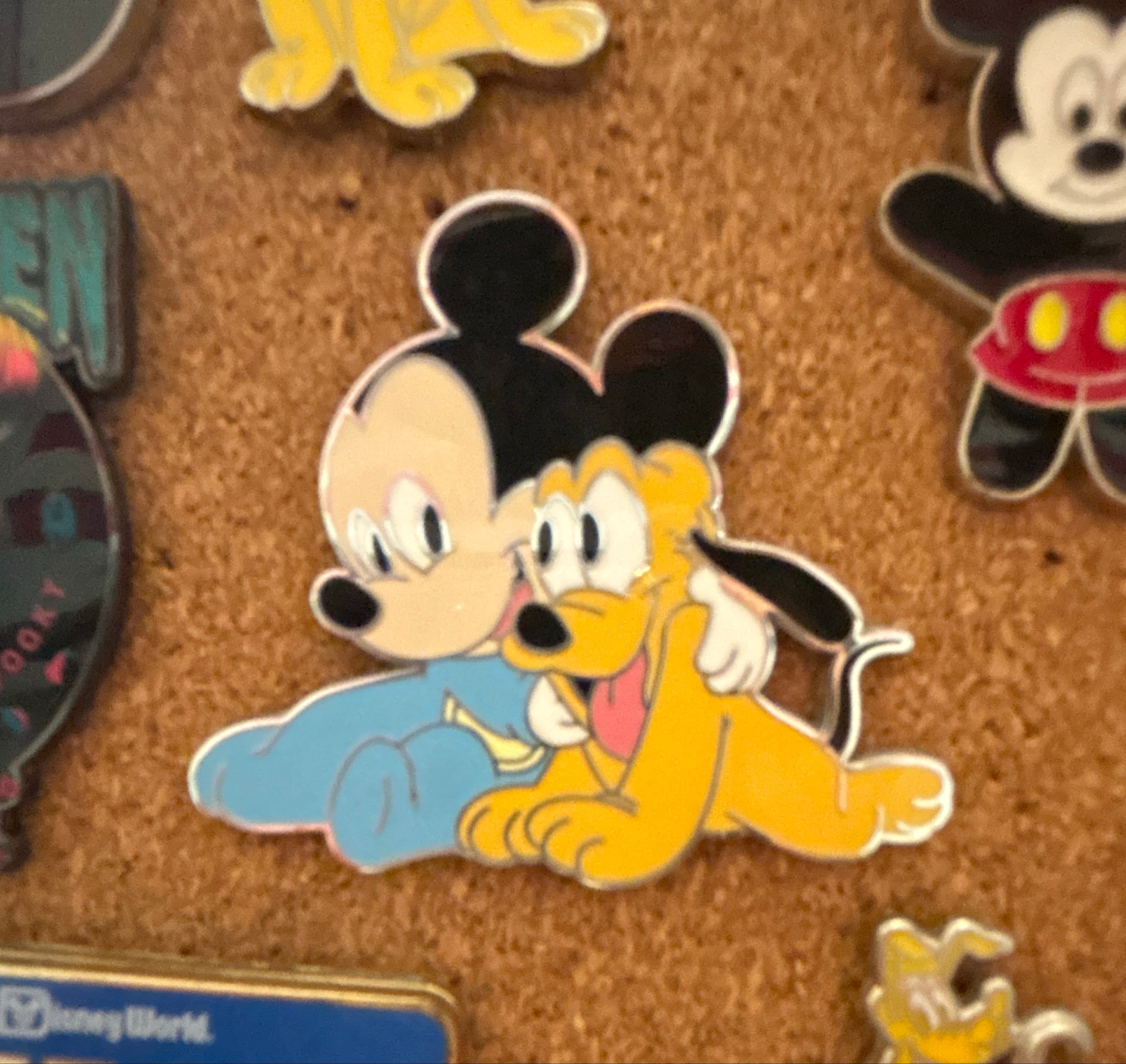Mickey Mouse hugging Pluto front