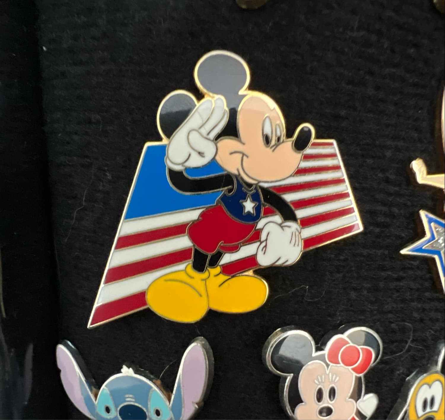 Mickey Mouse Saluting with the American Flag Behind Him