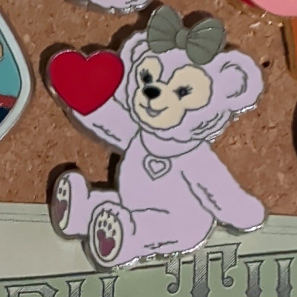 ShellieMay Sitting Holding Heart front