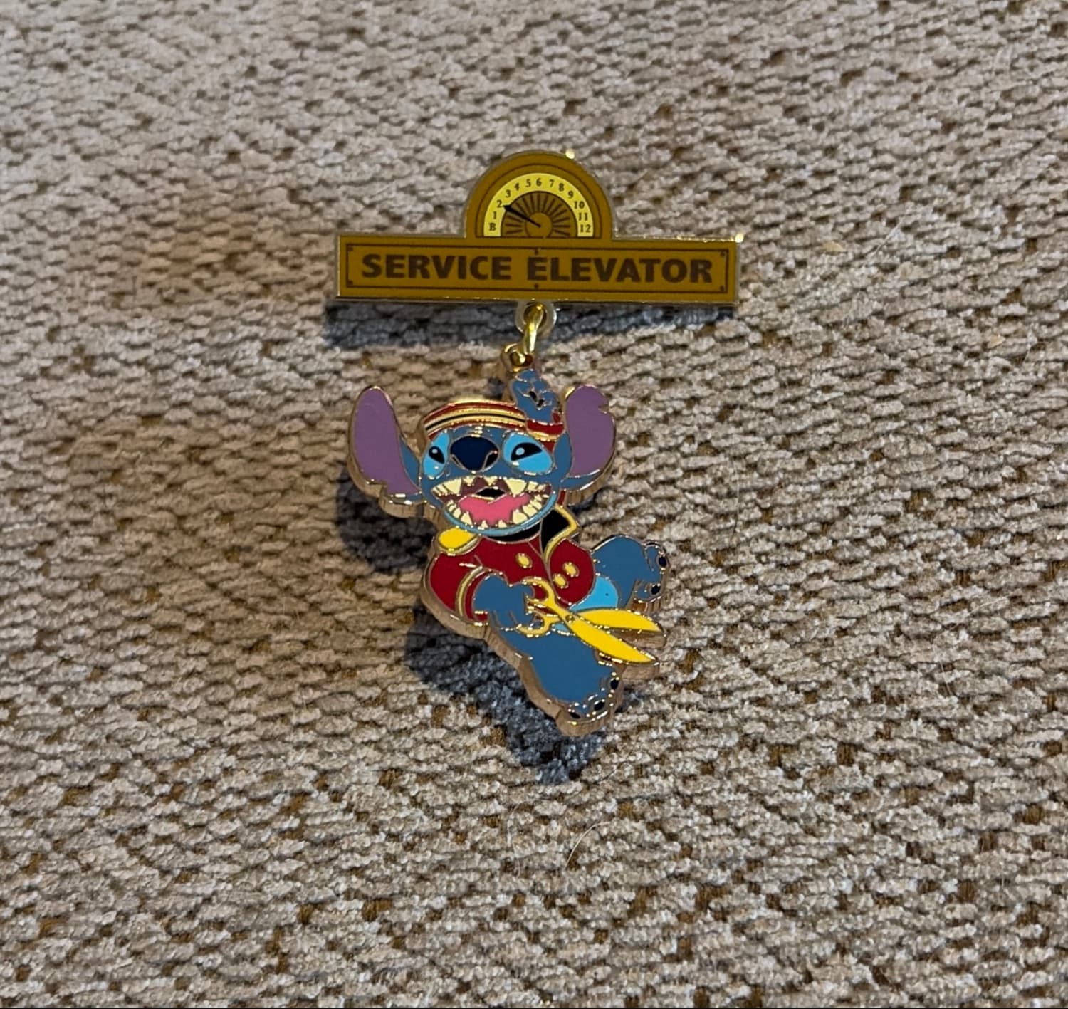 Bellhop Stitch Dangling From Service Elevator Sign