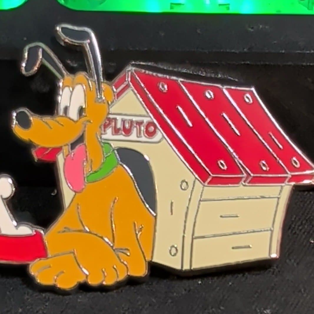 Pluto in Doghouse