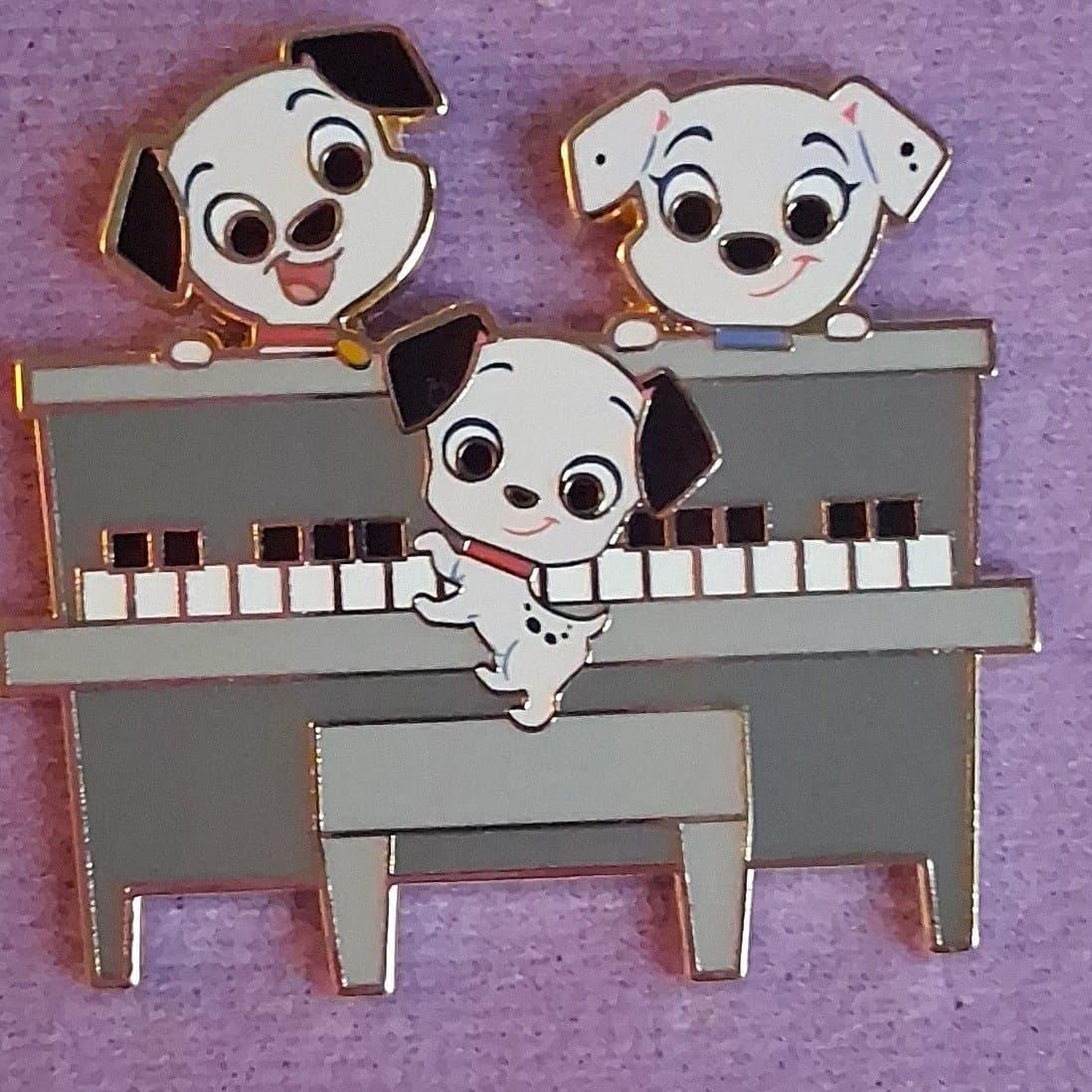 Dalmatians on Piano front