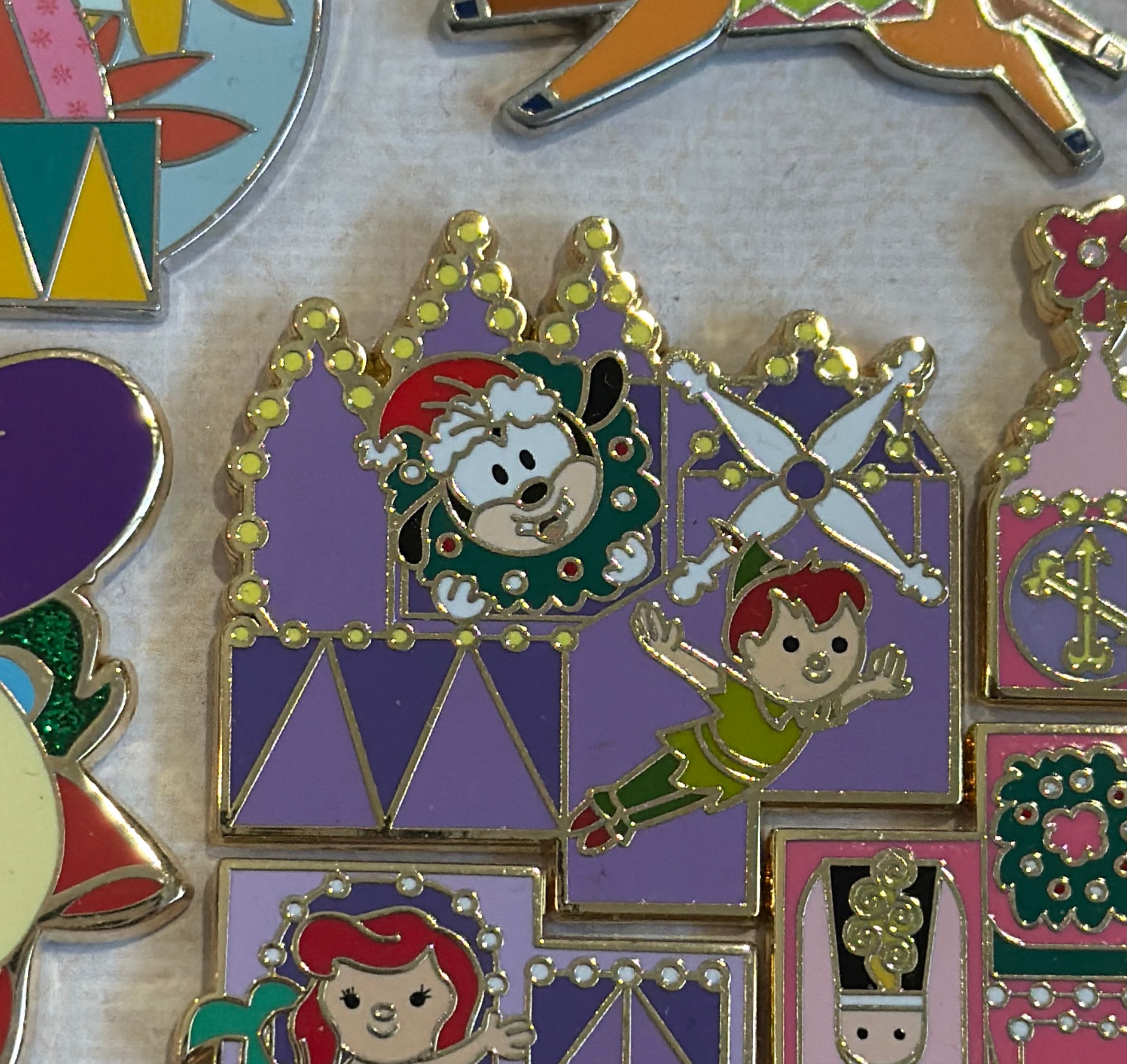 It's a Small World Holiday 2022 Mystery Pin - Goofy and Peter Pan front