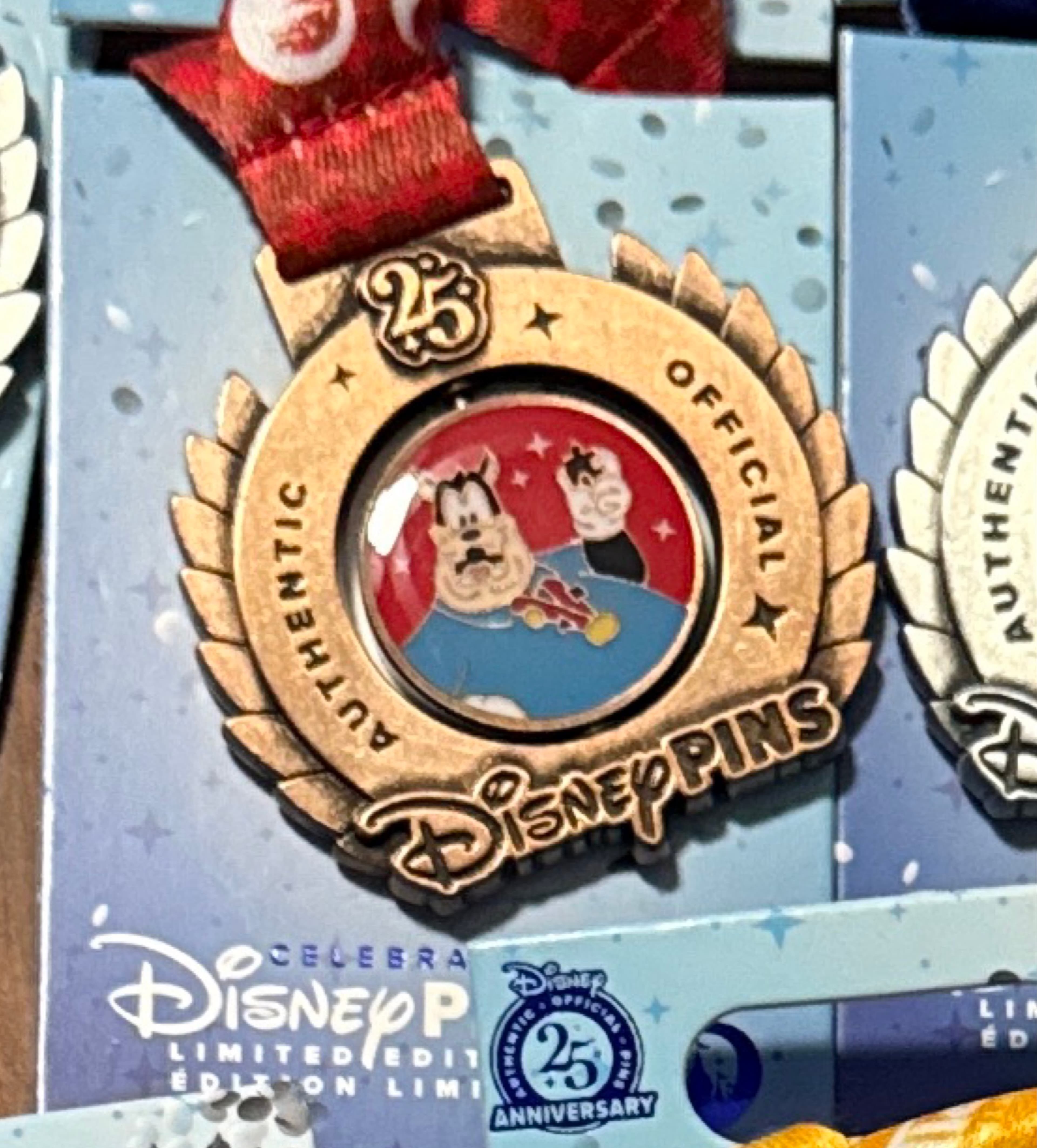 Pete Puzzle Collector - Celebrating Disney Pins 25: Medals front
