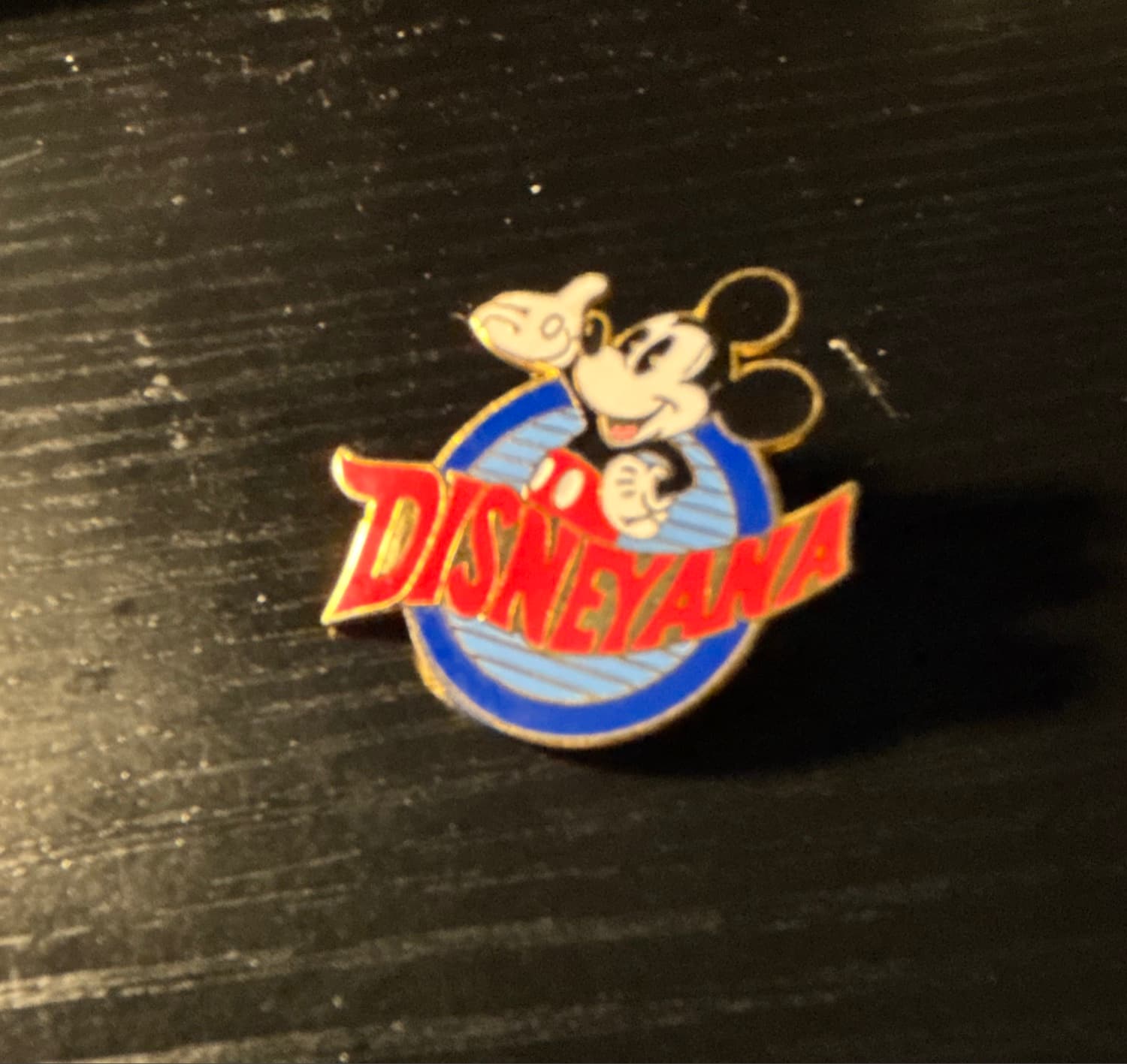 Disneyana Mickey (blue circle with red text version) front