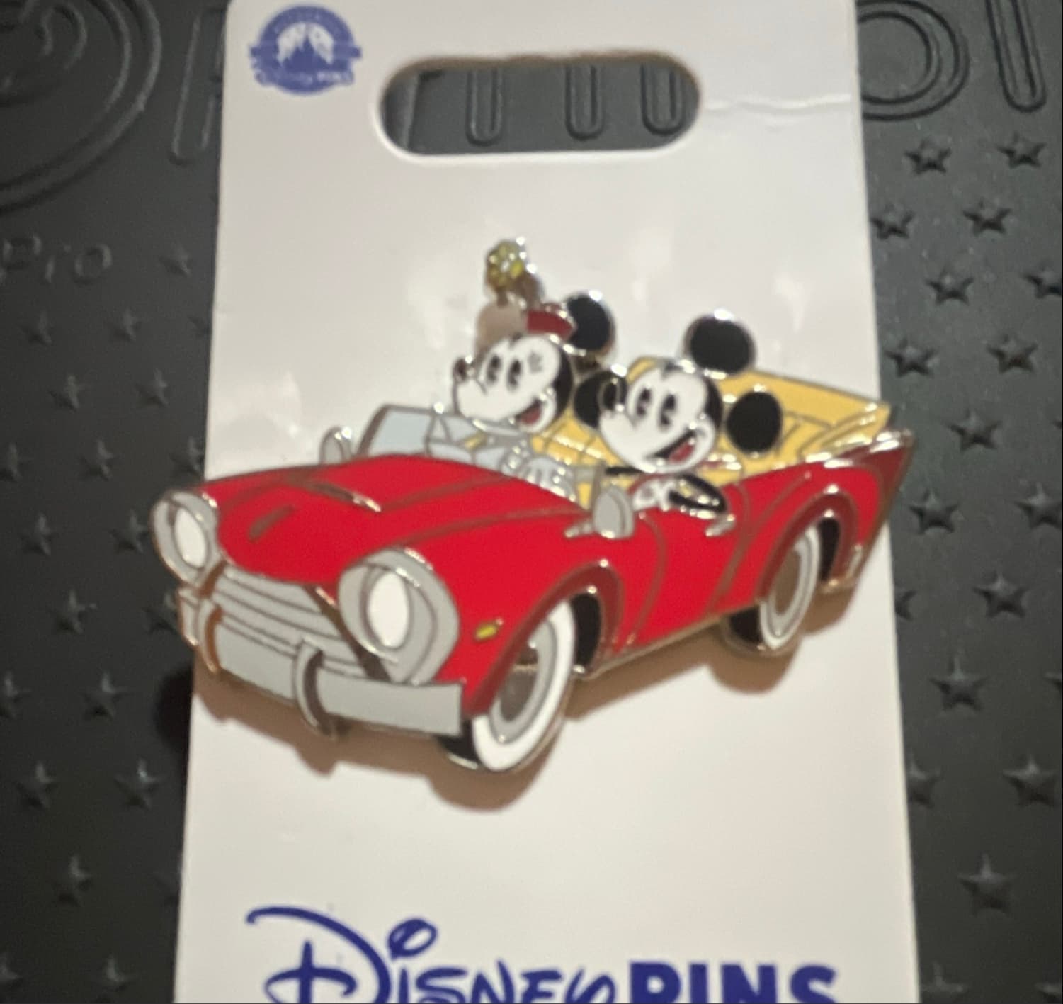 Mickey and Minnie in 1950s Red Convertible Car front