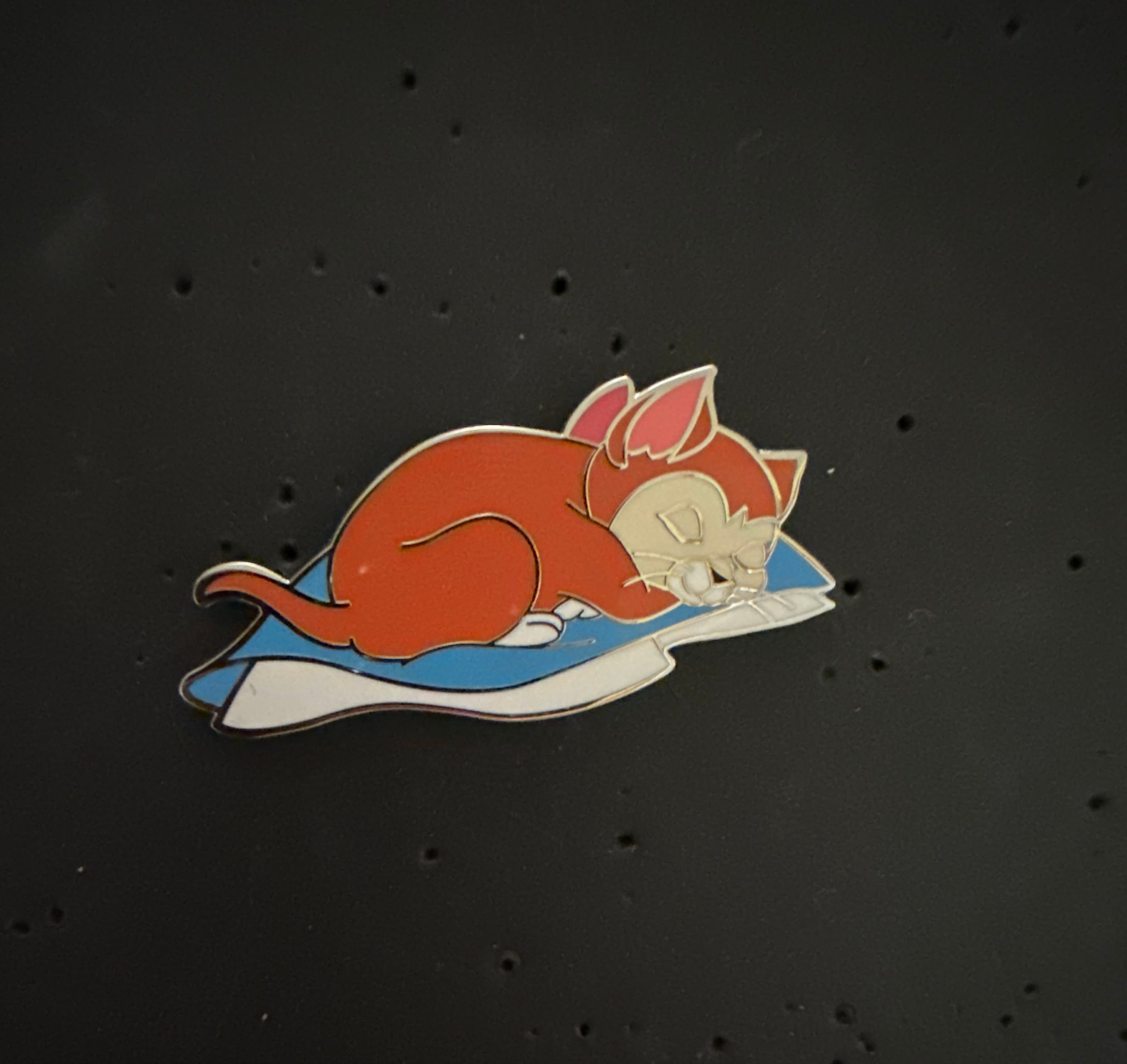 Sleeping Figaro in Patchwork Bed front