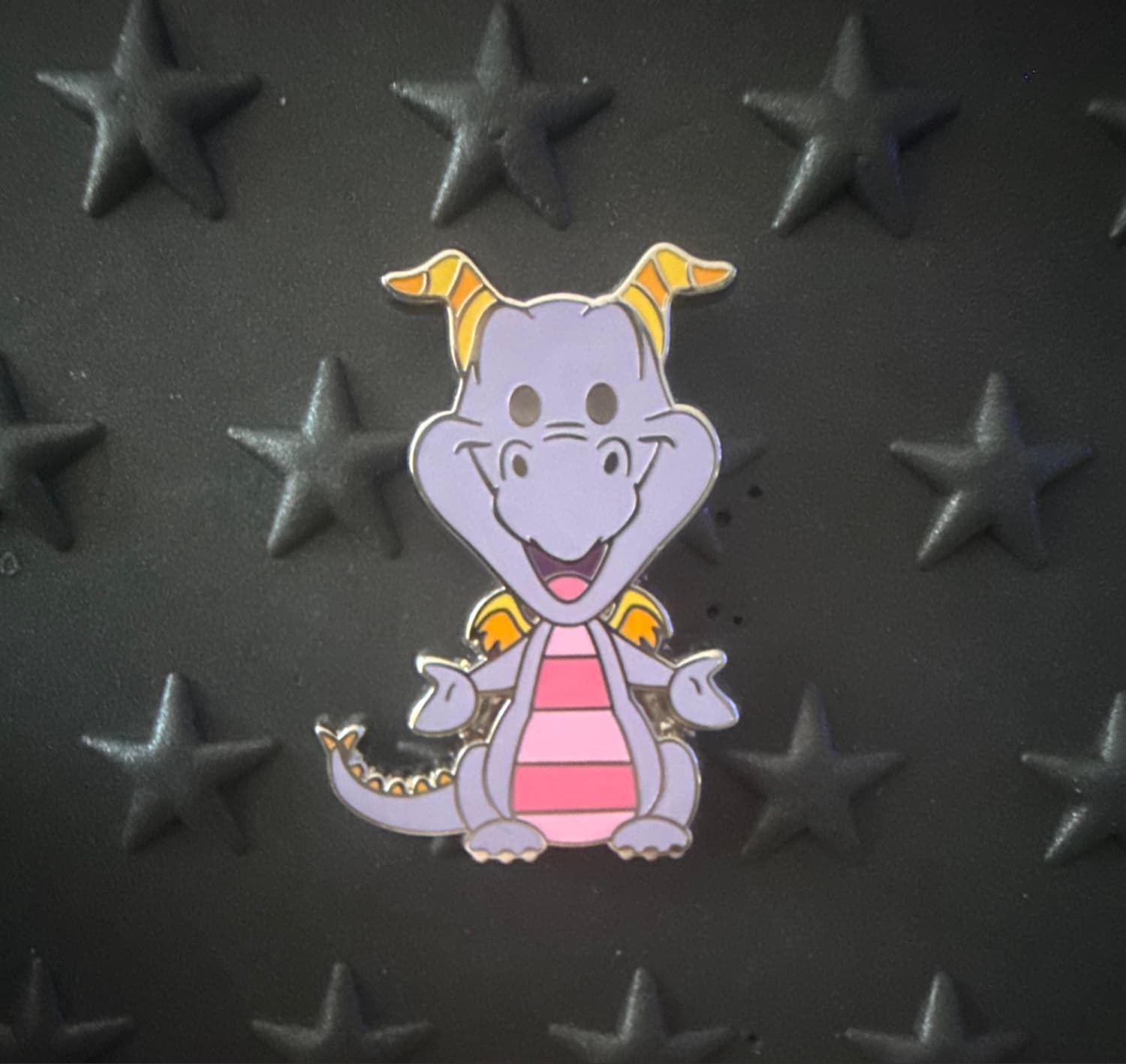 Figment (artist signature part of pin)