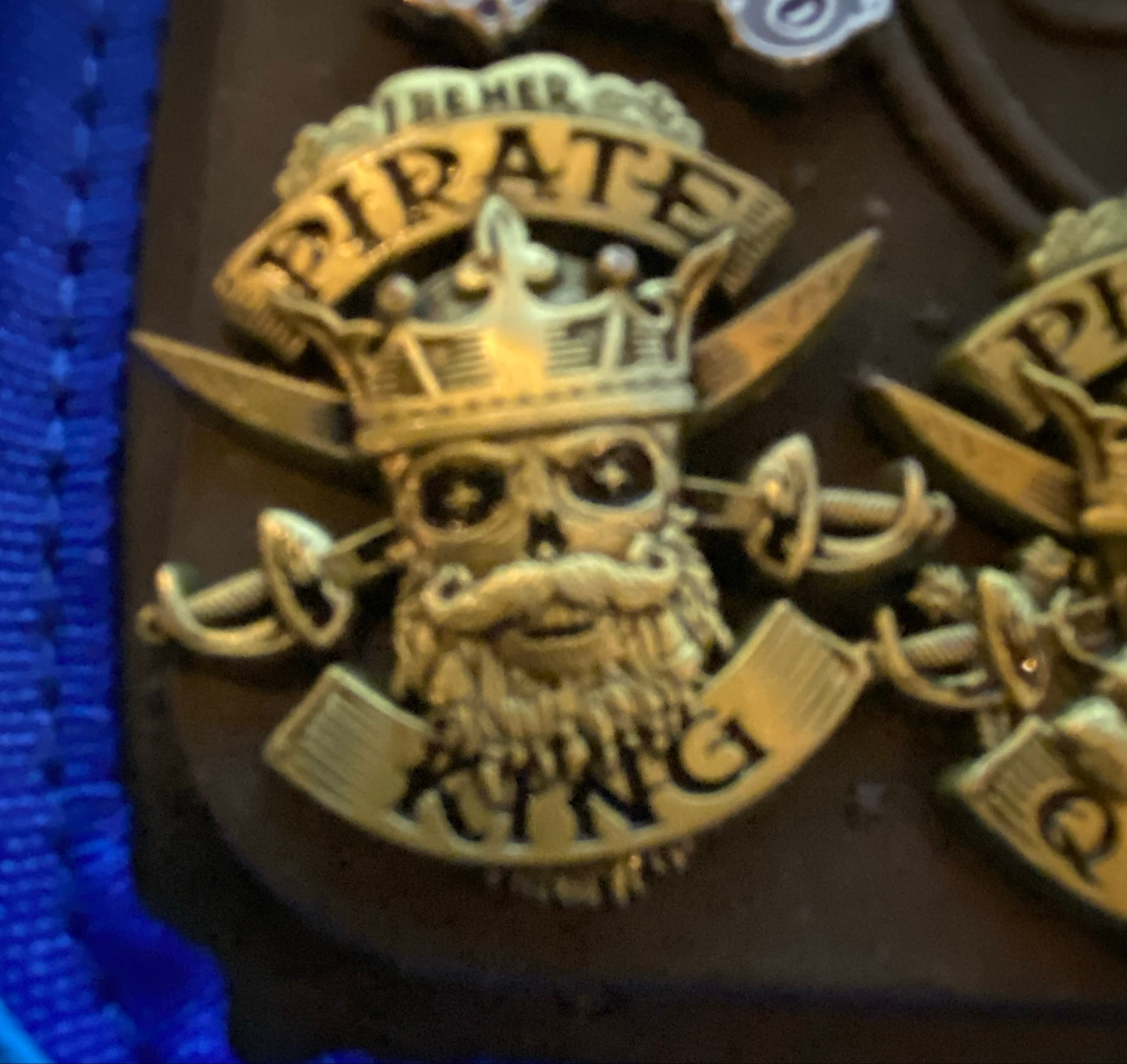 Pirate King Skull with Crown and Crossed Swords front