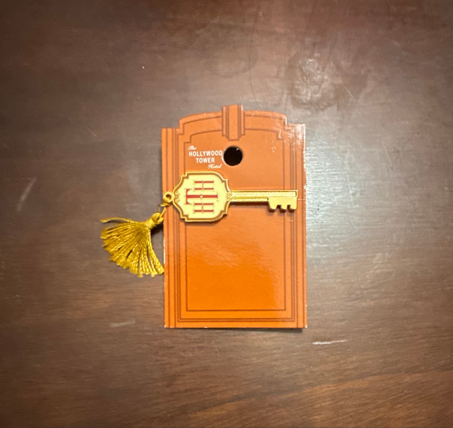 Hollywood Tower Hotel Key with Tassel Pin front