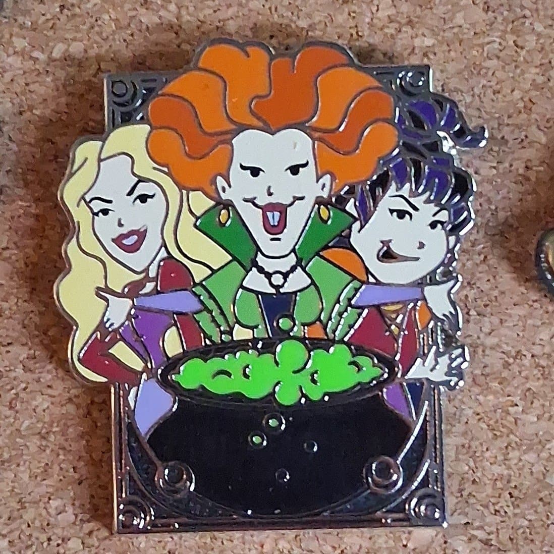 Sarah, Mary, and Winifred Sanderson around Cauldron front