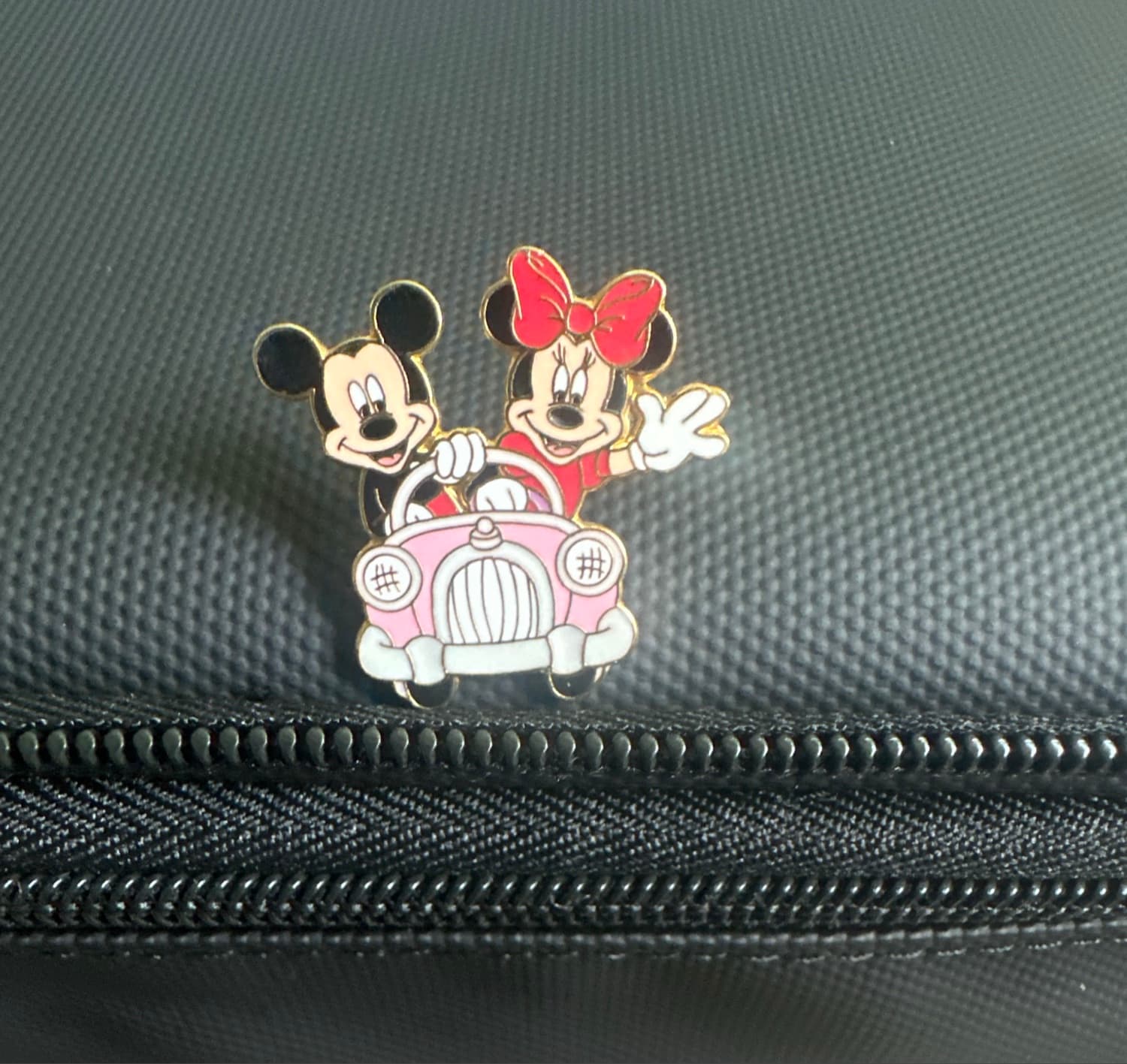 Mickey and Minnie in a Pink Car front