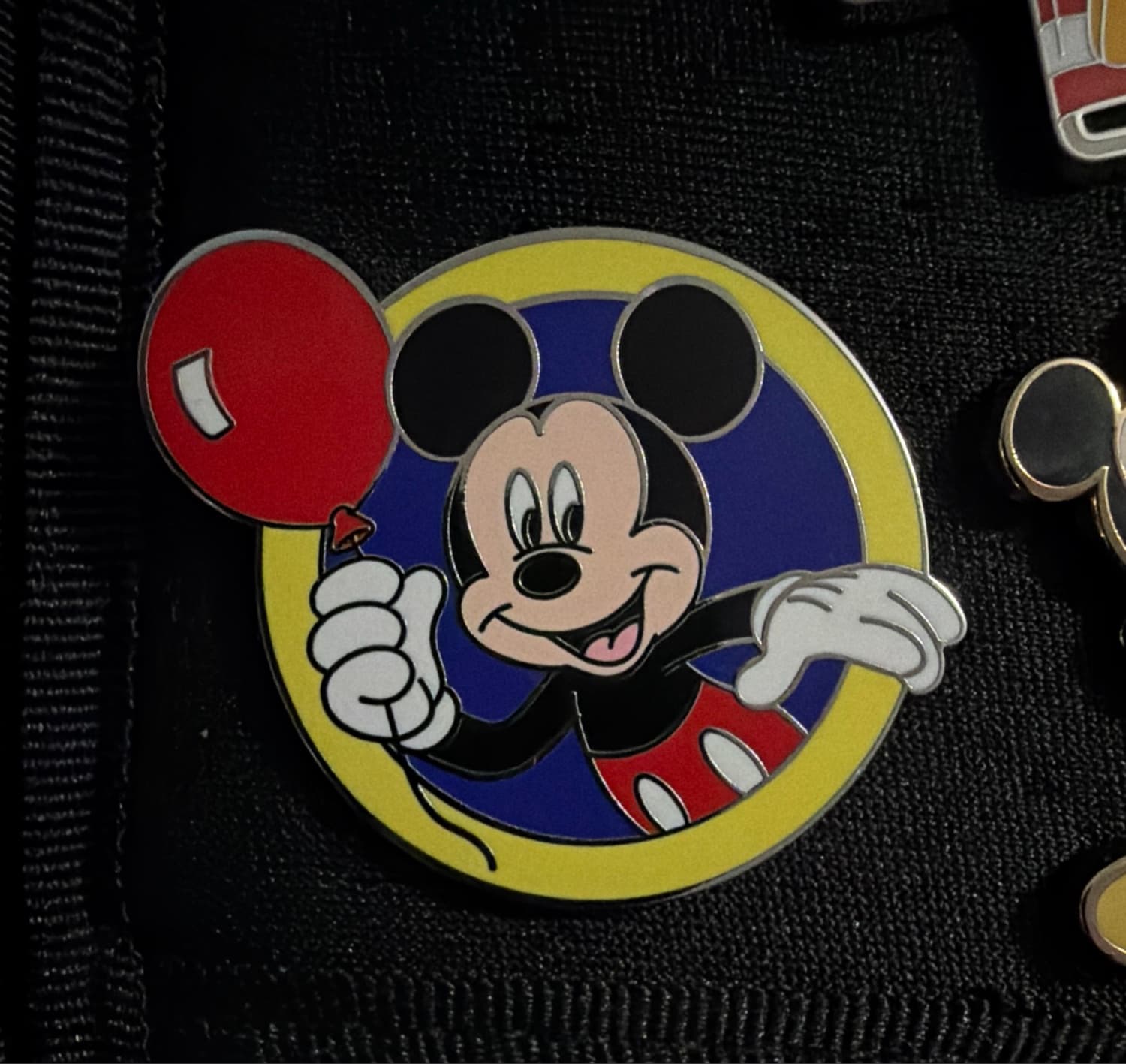 Mickey Mouse Holding Red Balloon in Mickey Icon Frame