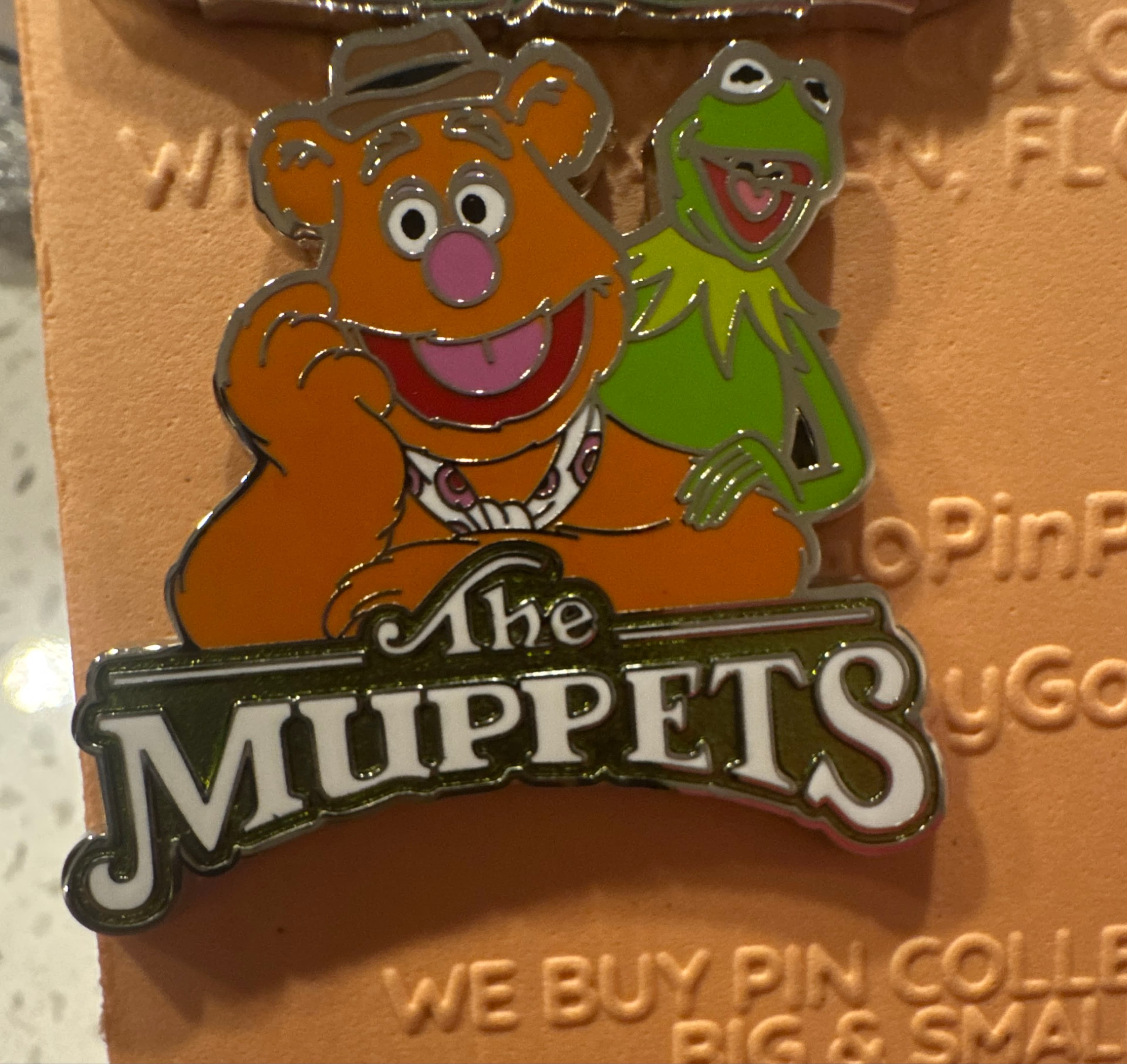 The Muppets Fozzie Bear and Kermit the Frog Logo Pin front