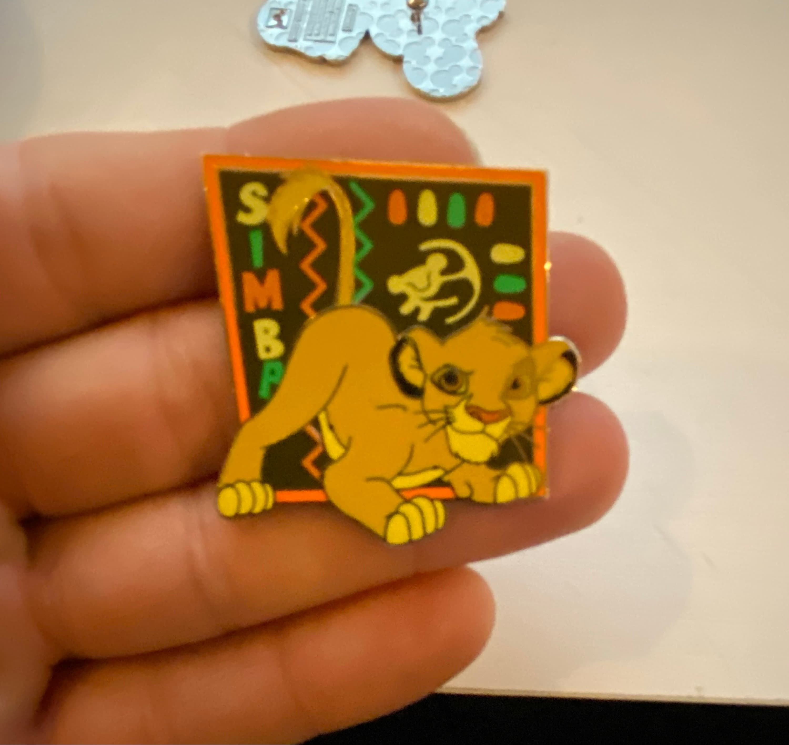 Simba Cub Tribal Pattern with 'SIMBA' Text Pin front