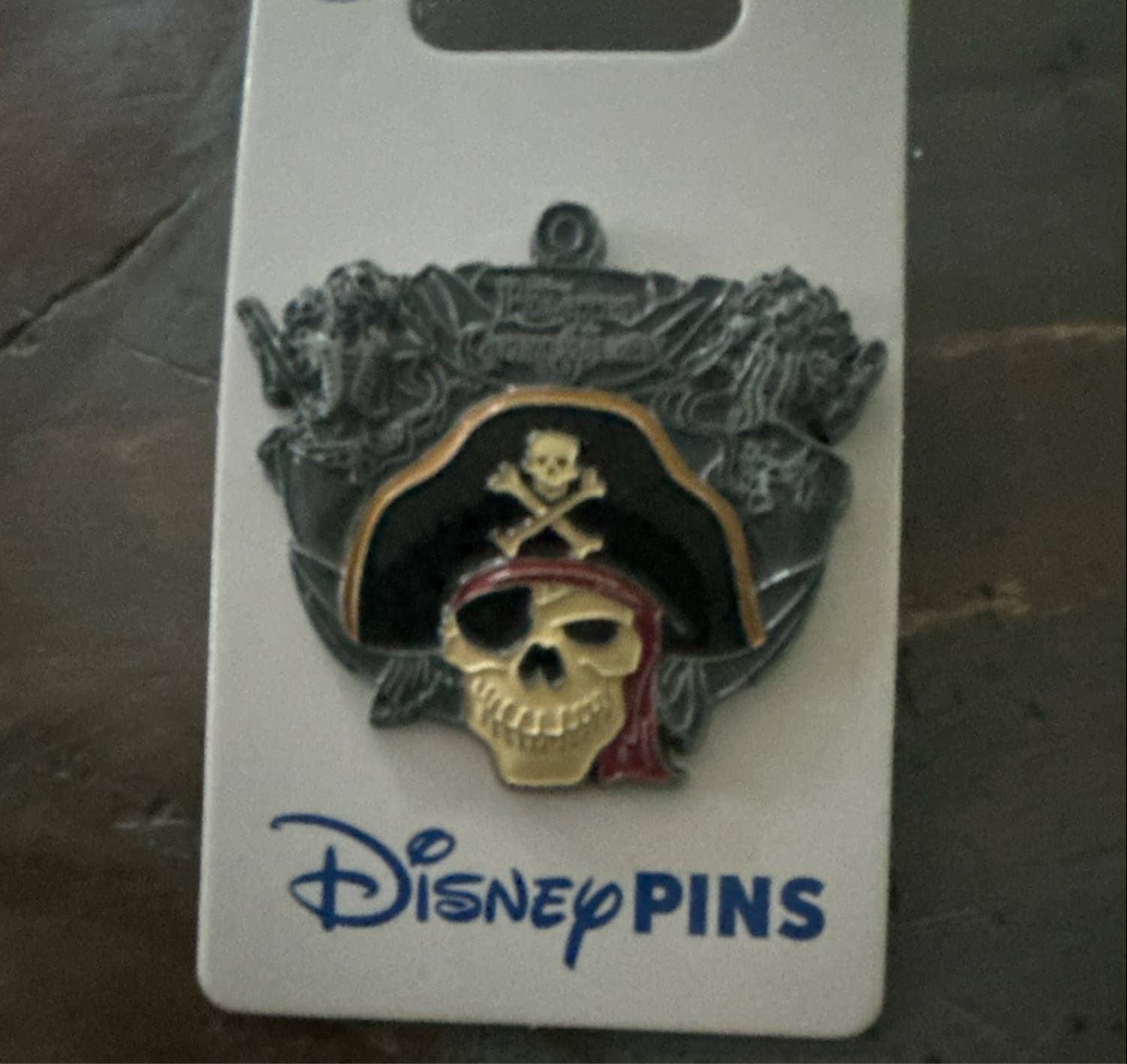 Pirates of the Caribbean Skull with Mermaids Pin front