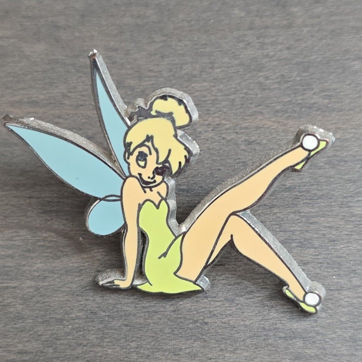 Jerry Leigh Tinker Bell Sitting with Right Leg Raised front