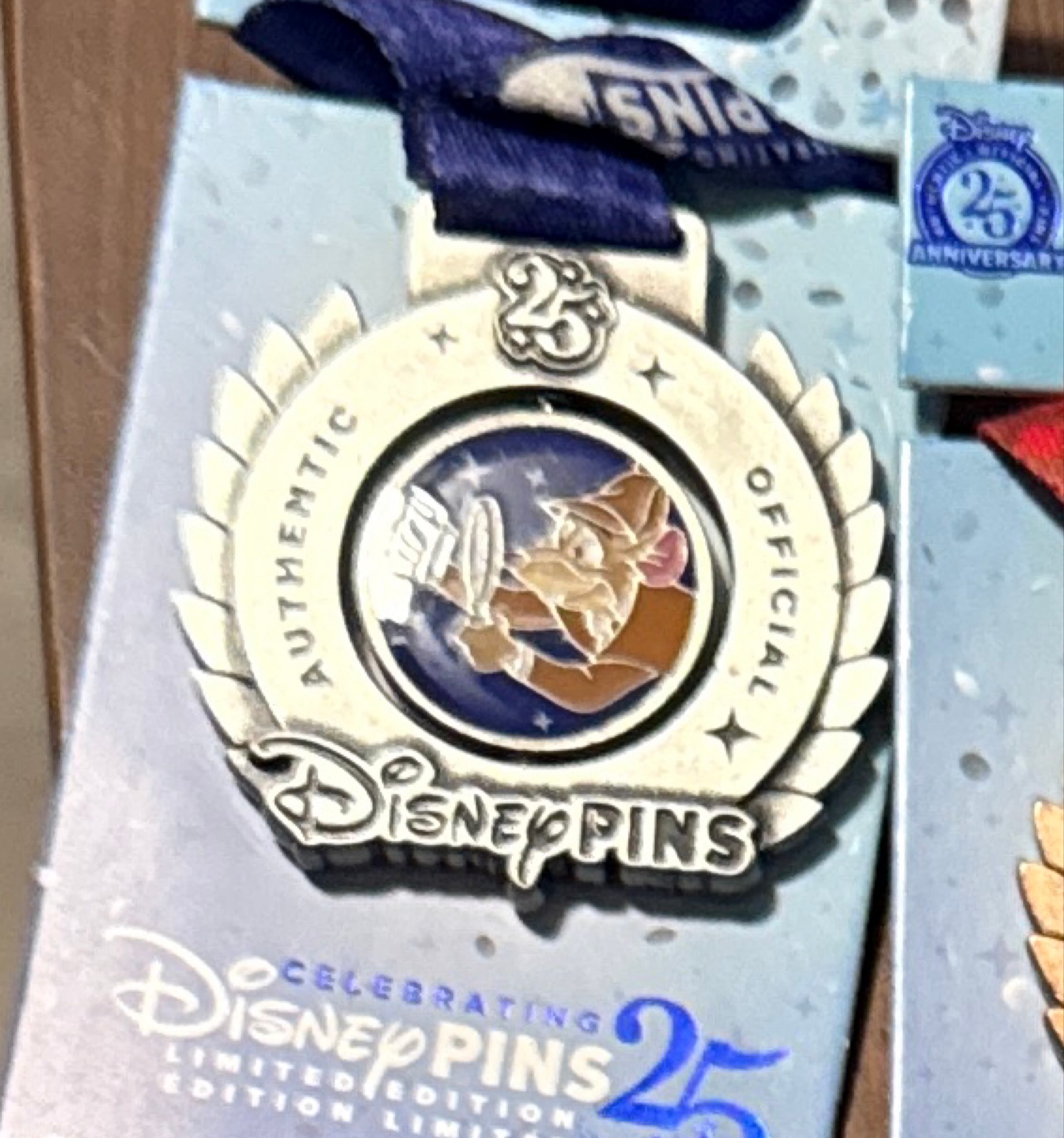 Basil - Master of Mystery - Celebrating Disney Pins 25: Medals front