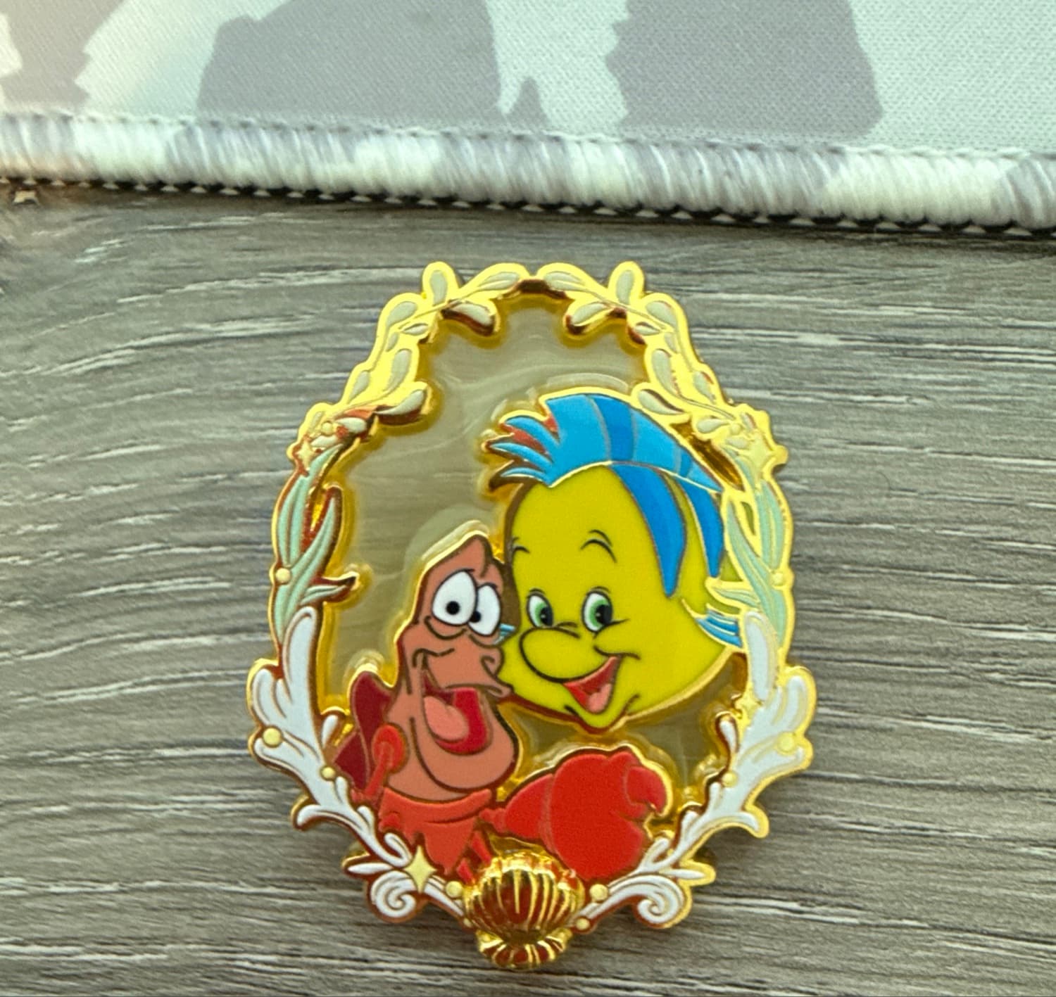 The Little Mermaid Stained Glass Portrait Pin - Flounder & Sebastian front