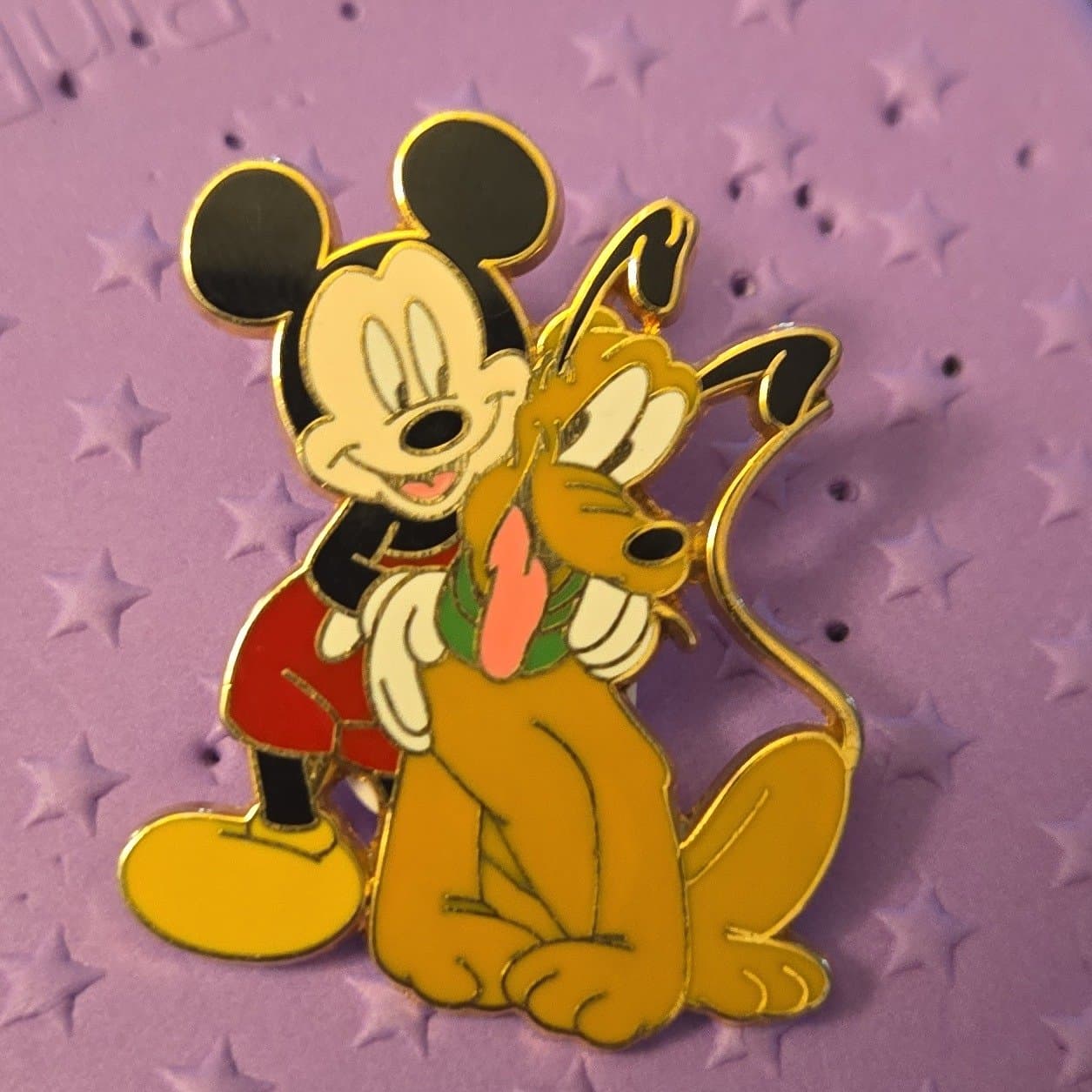 Mickey Mouse and Pluto Hugging front