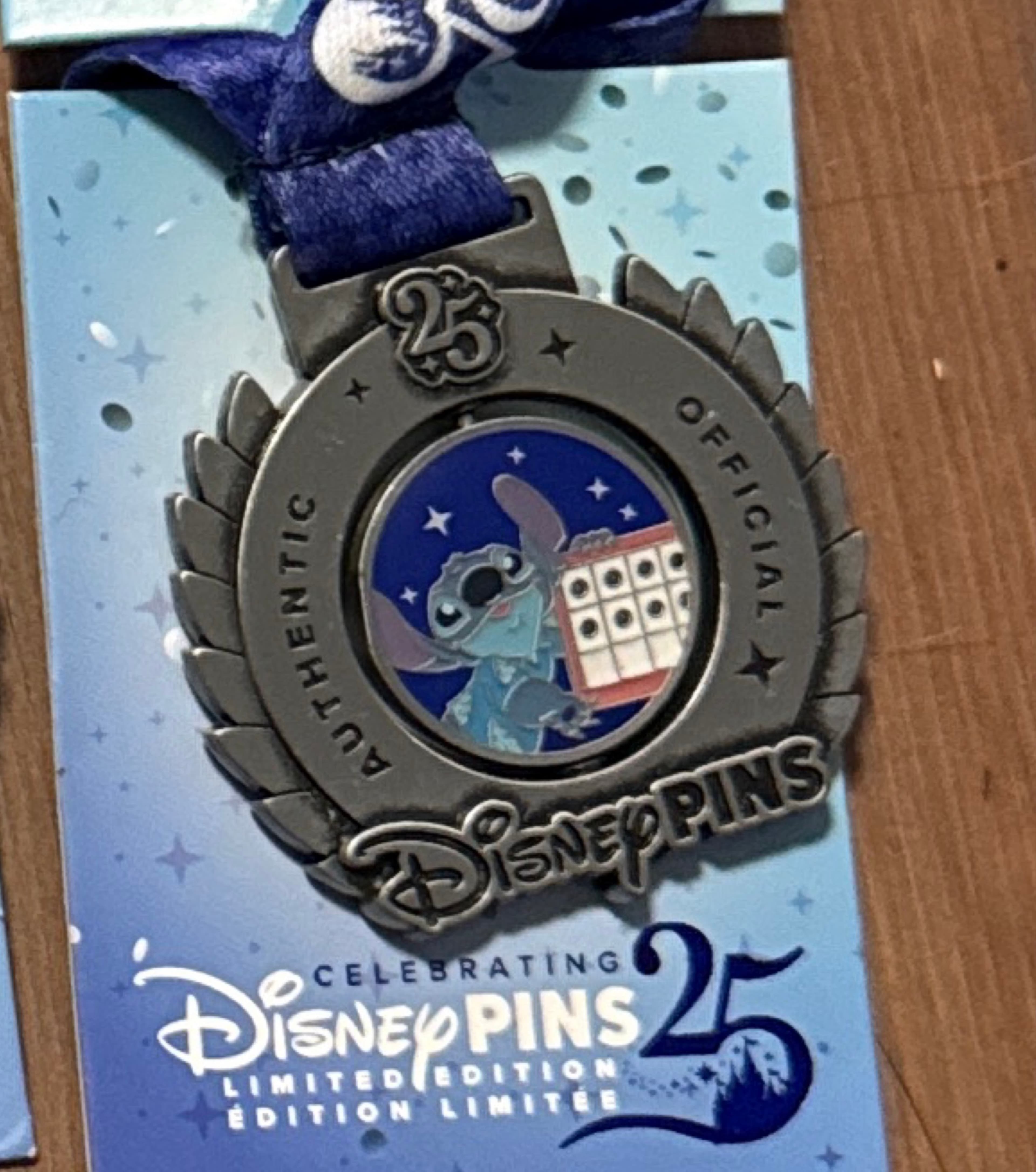 Stitch Pin of the Month - Pin Trading 25th Anniversary Medals front