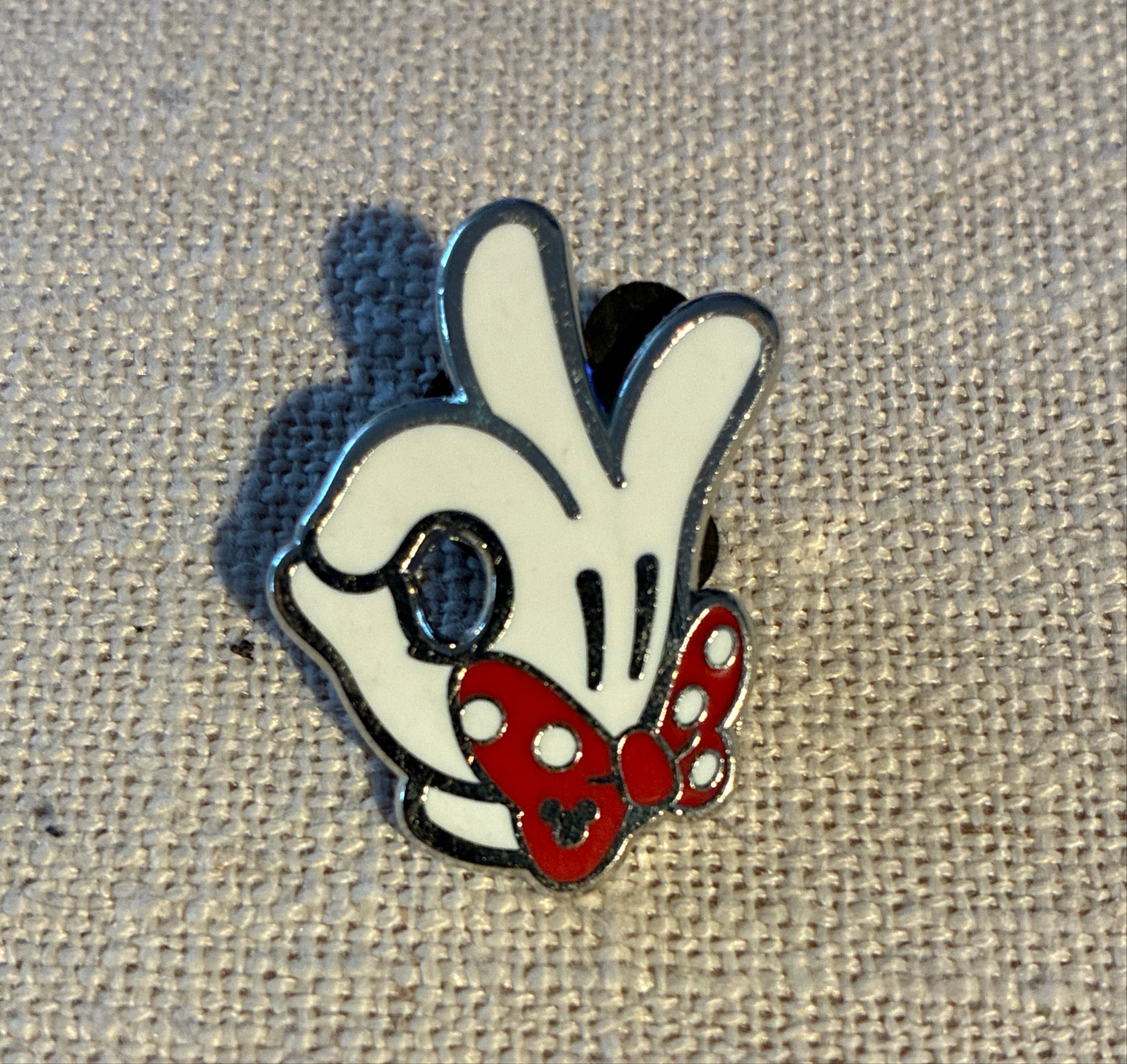 Minnie Mouse OK Sign Glove Hand with Red Bow - Hidden Mickey front