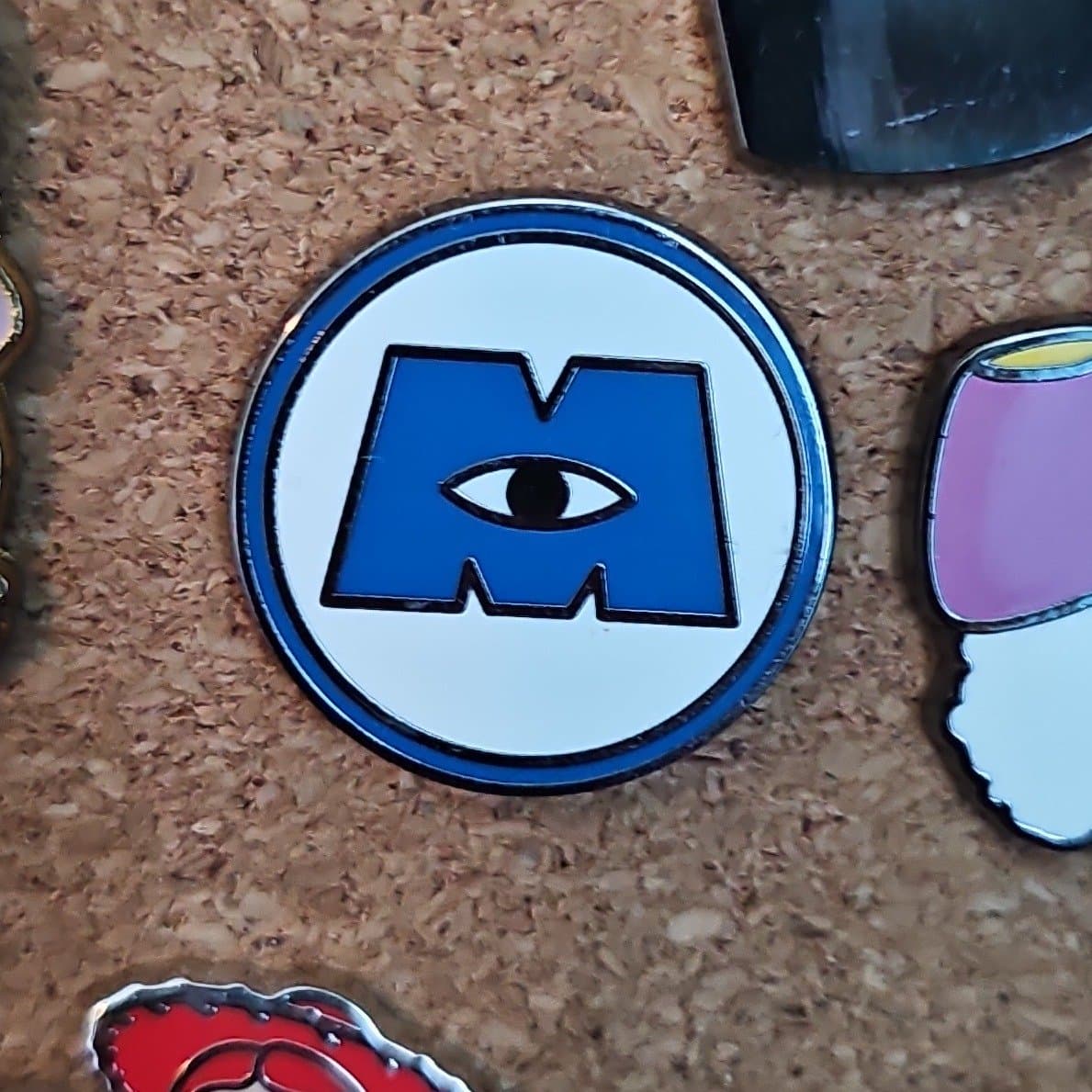 Monsters, Inc. Logo Pin front