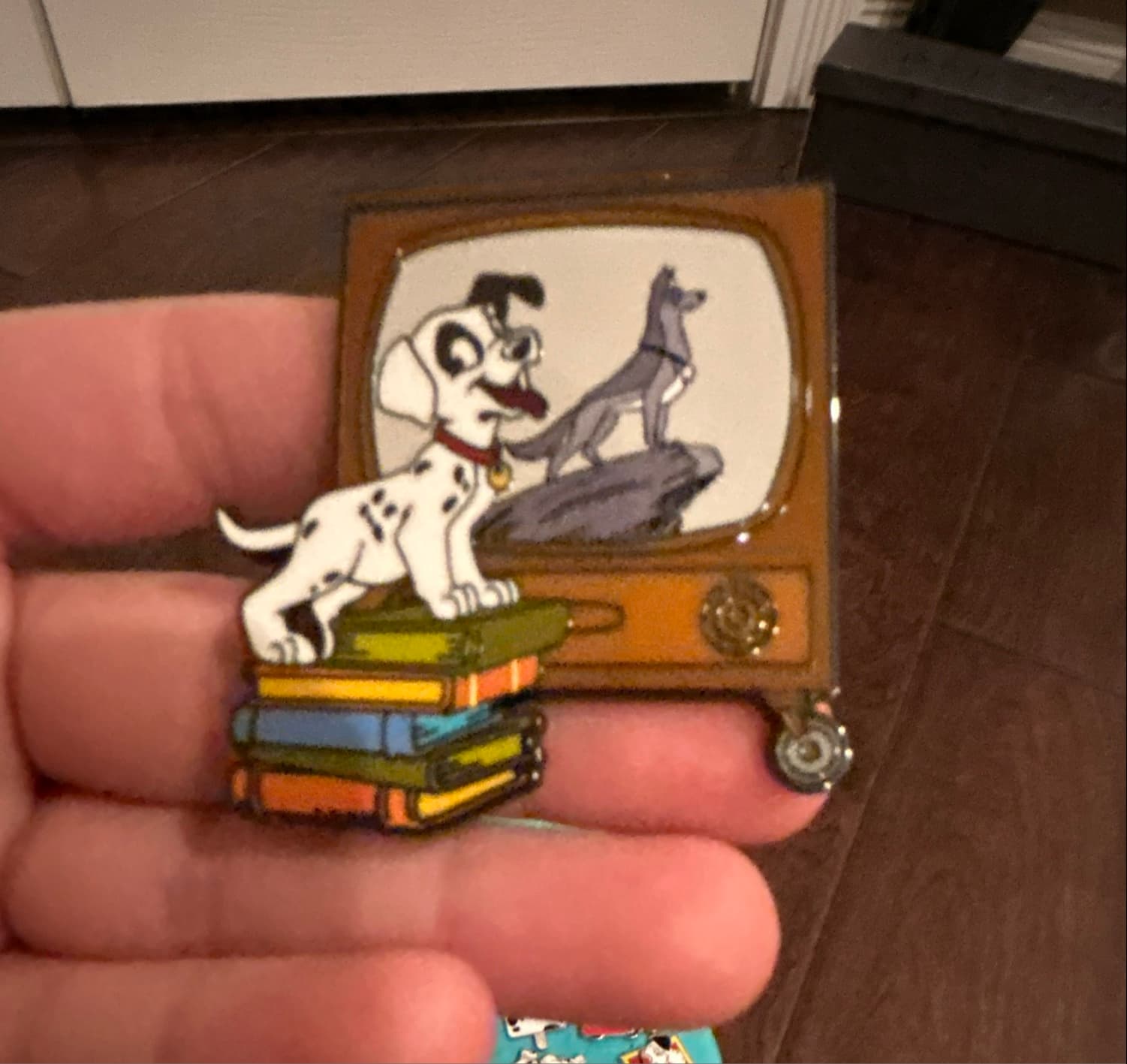 101 Dalmatians Patch on Books Watching TV front