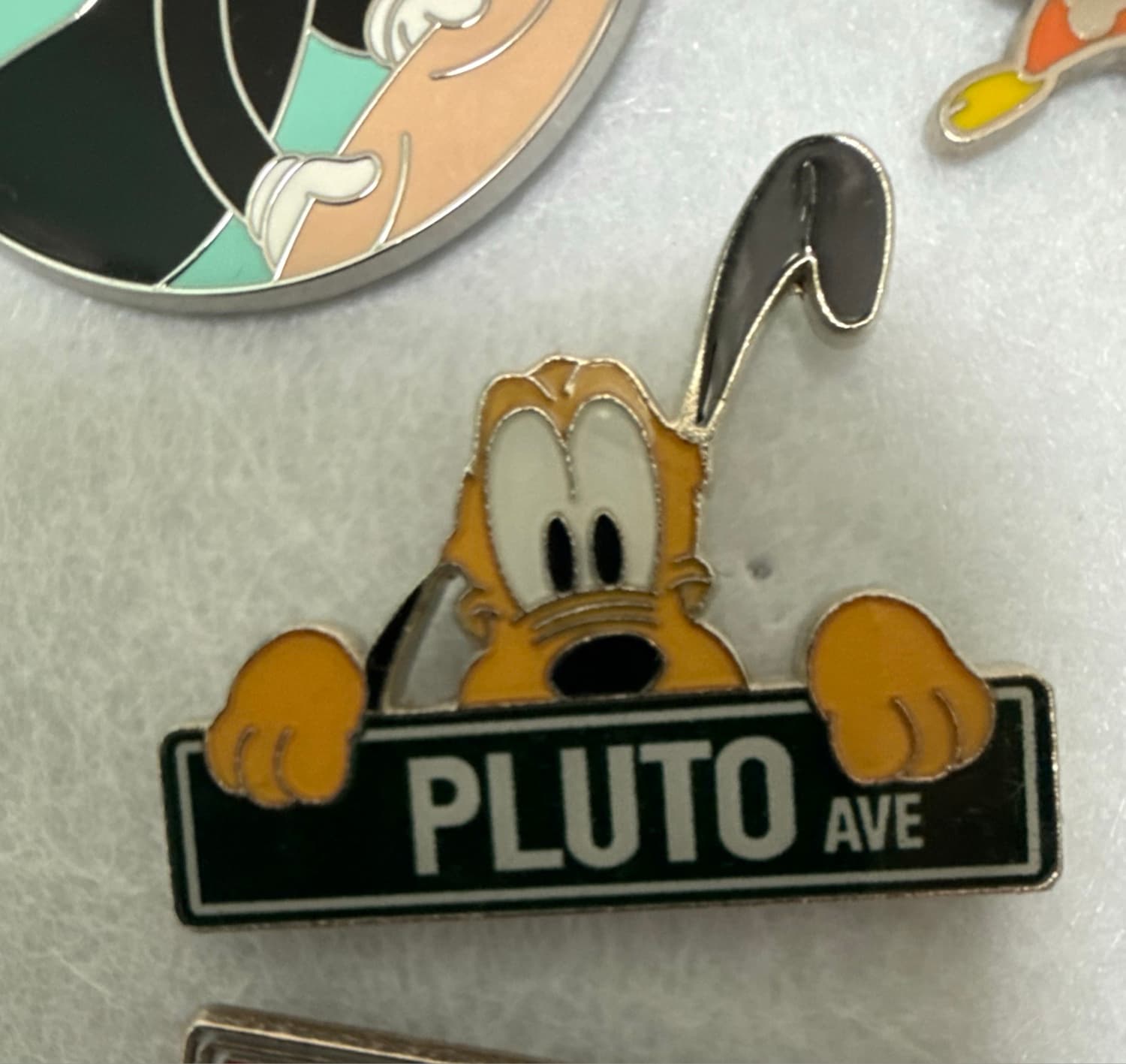 Pluto Ave