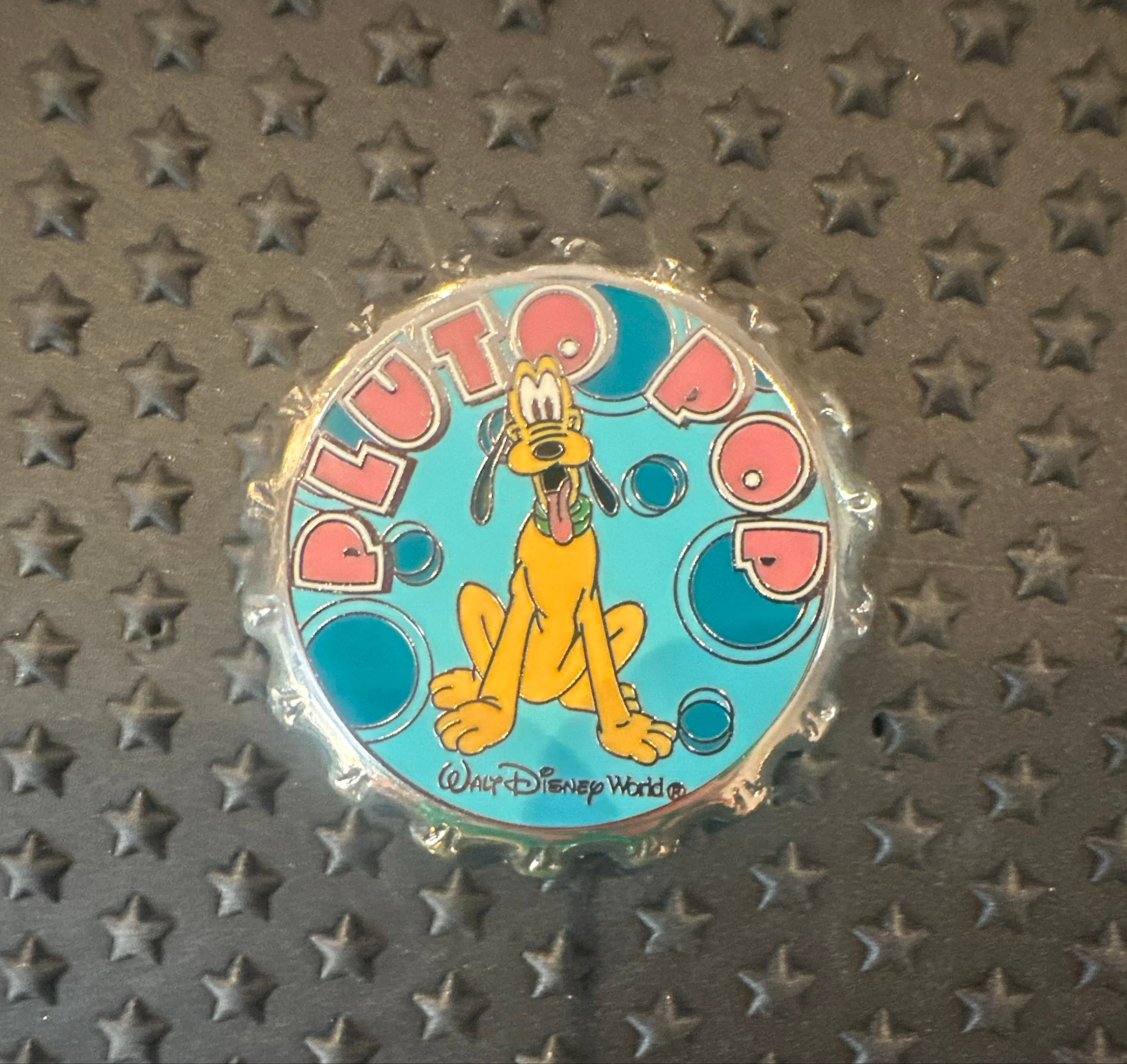 Pluto Pop Soda Bottle Cap Pin front