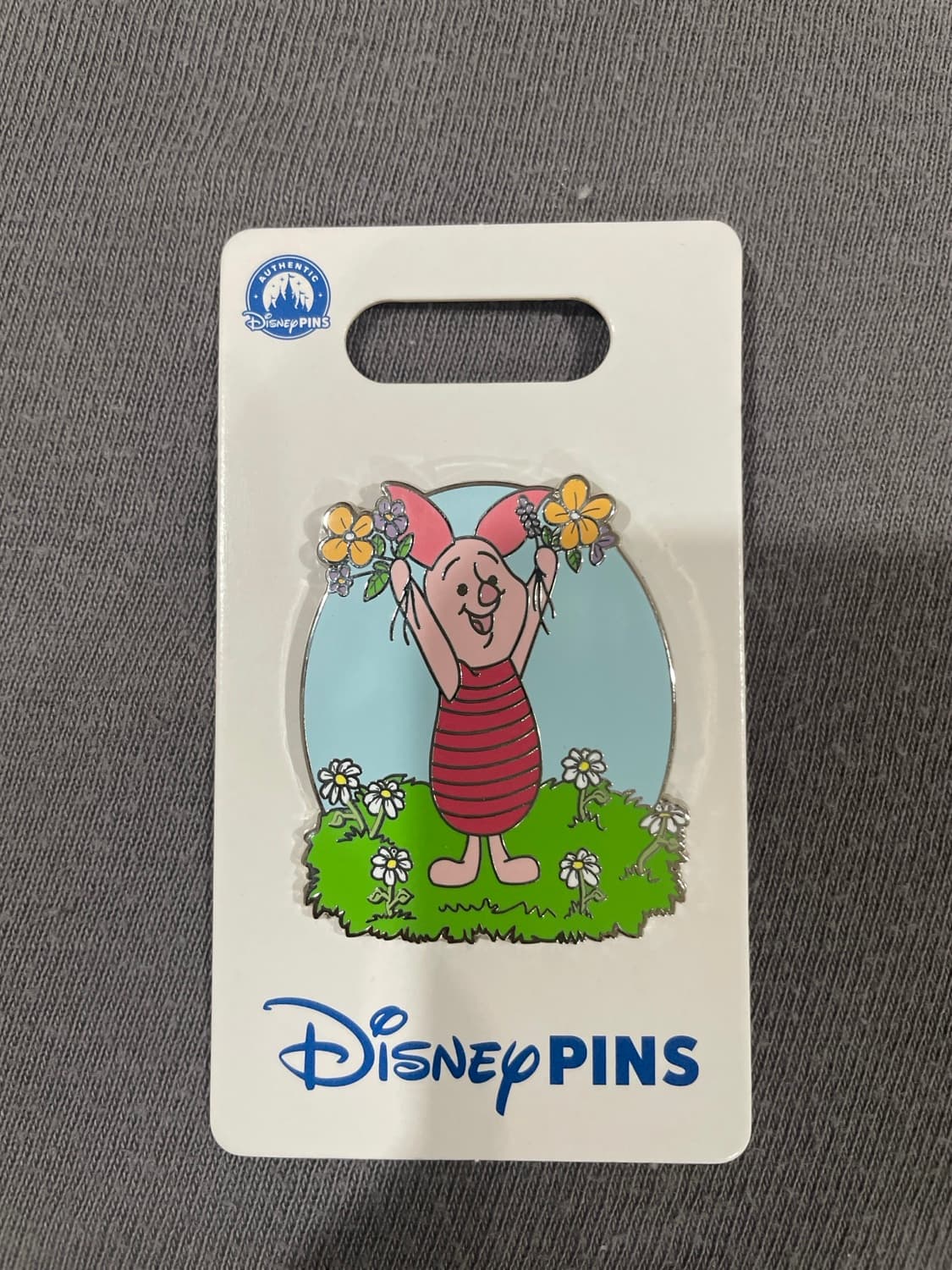 Piglet Poses with Flowers