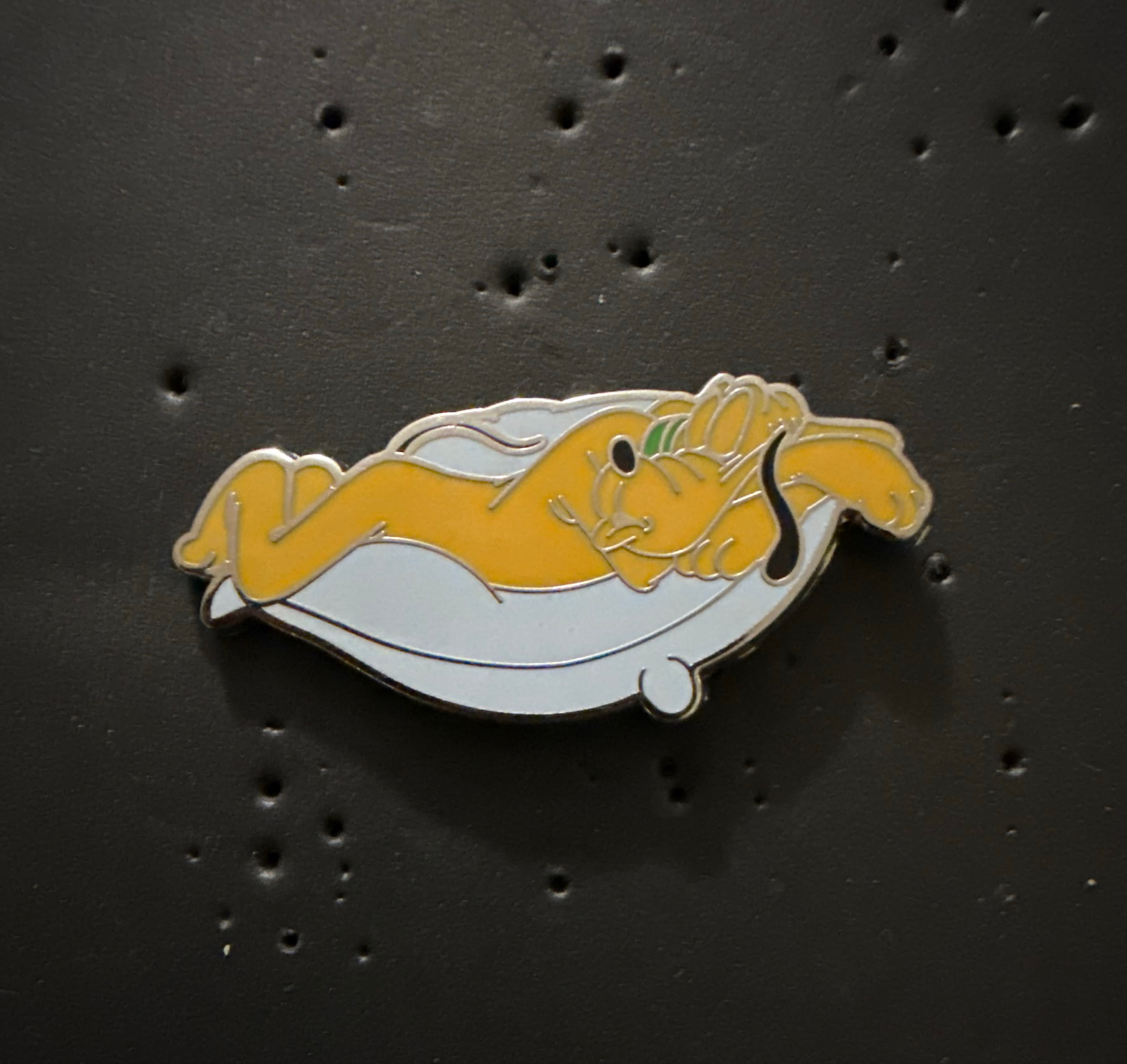 Pluto Sleeping on Pillow front