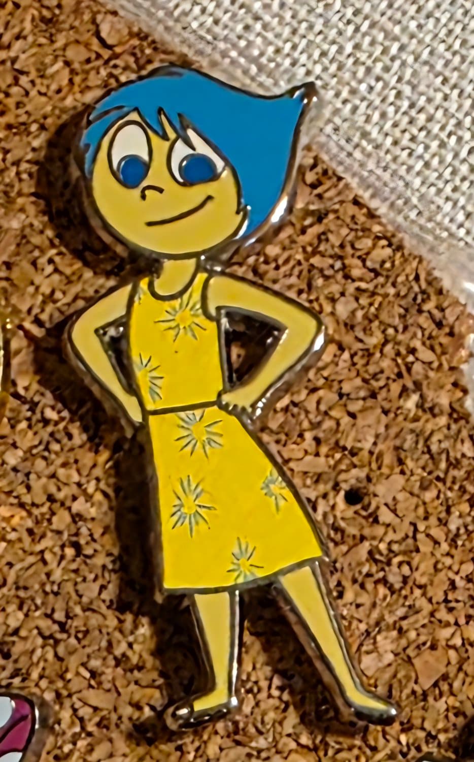 Joy Standing in Yellow Starburst Dress - Inside Out front