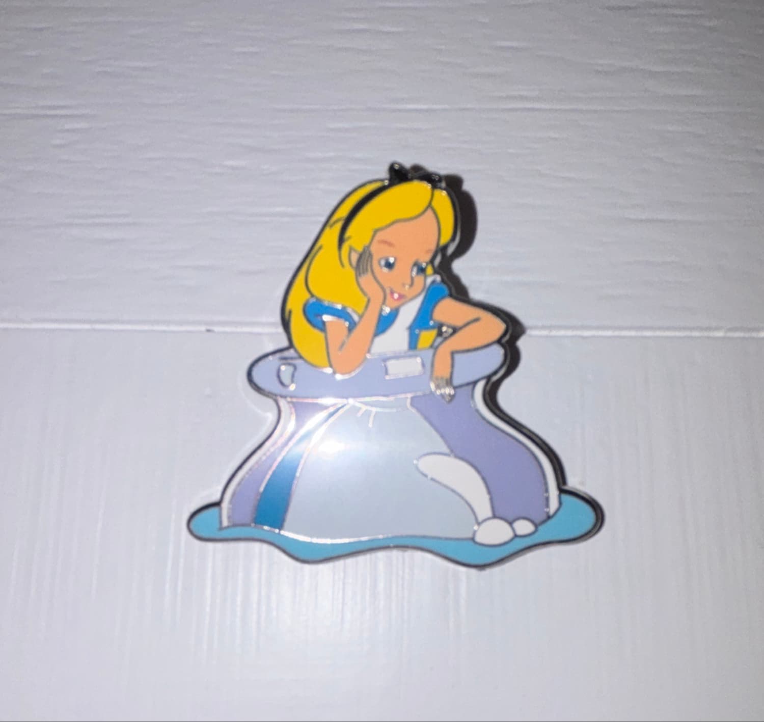 Alice Floating in Bottle front