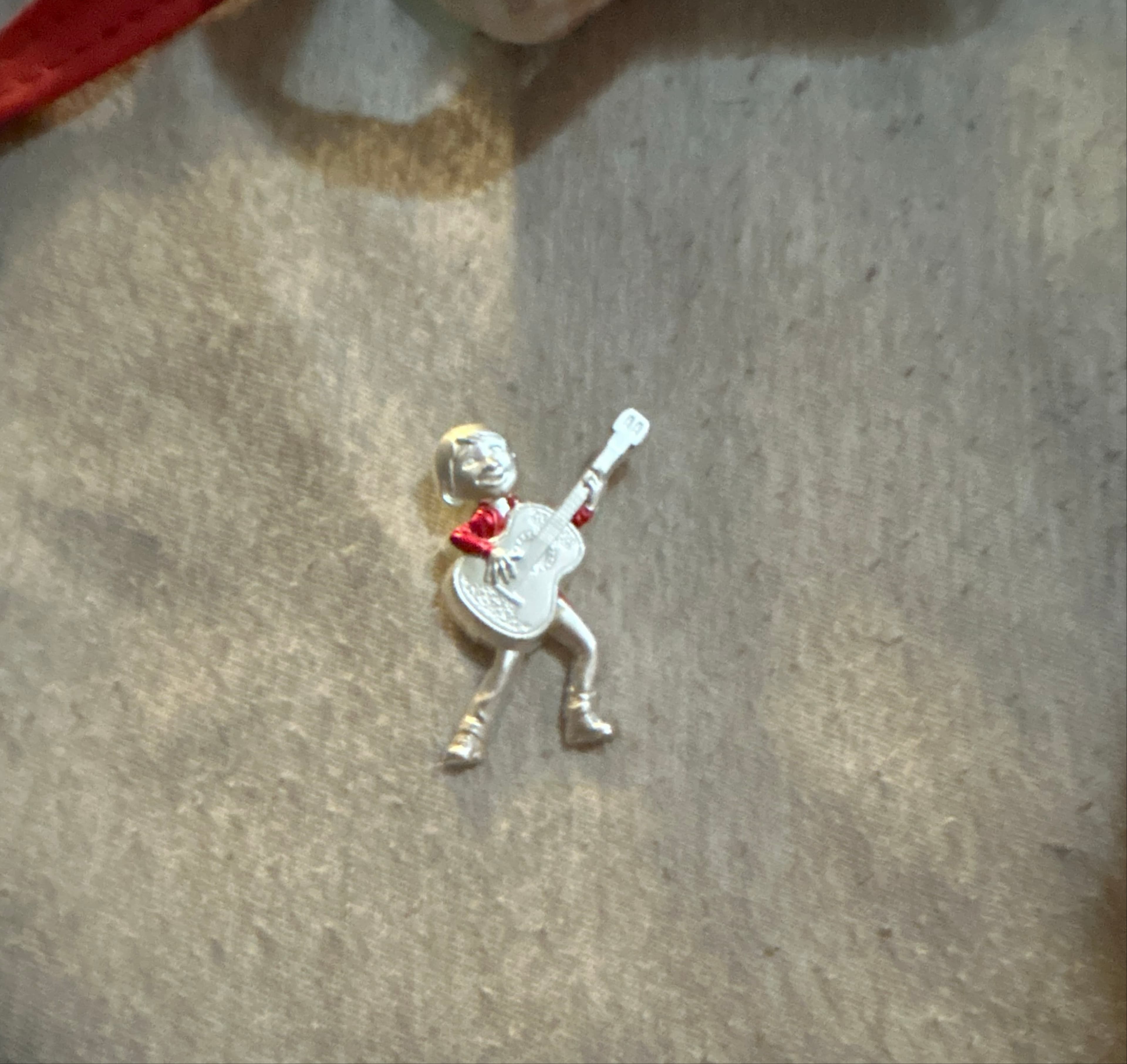 Miguel Playing Guitar - Coco front