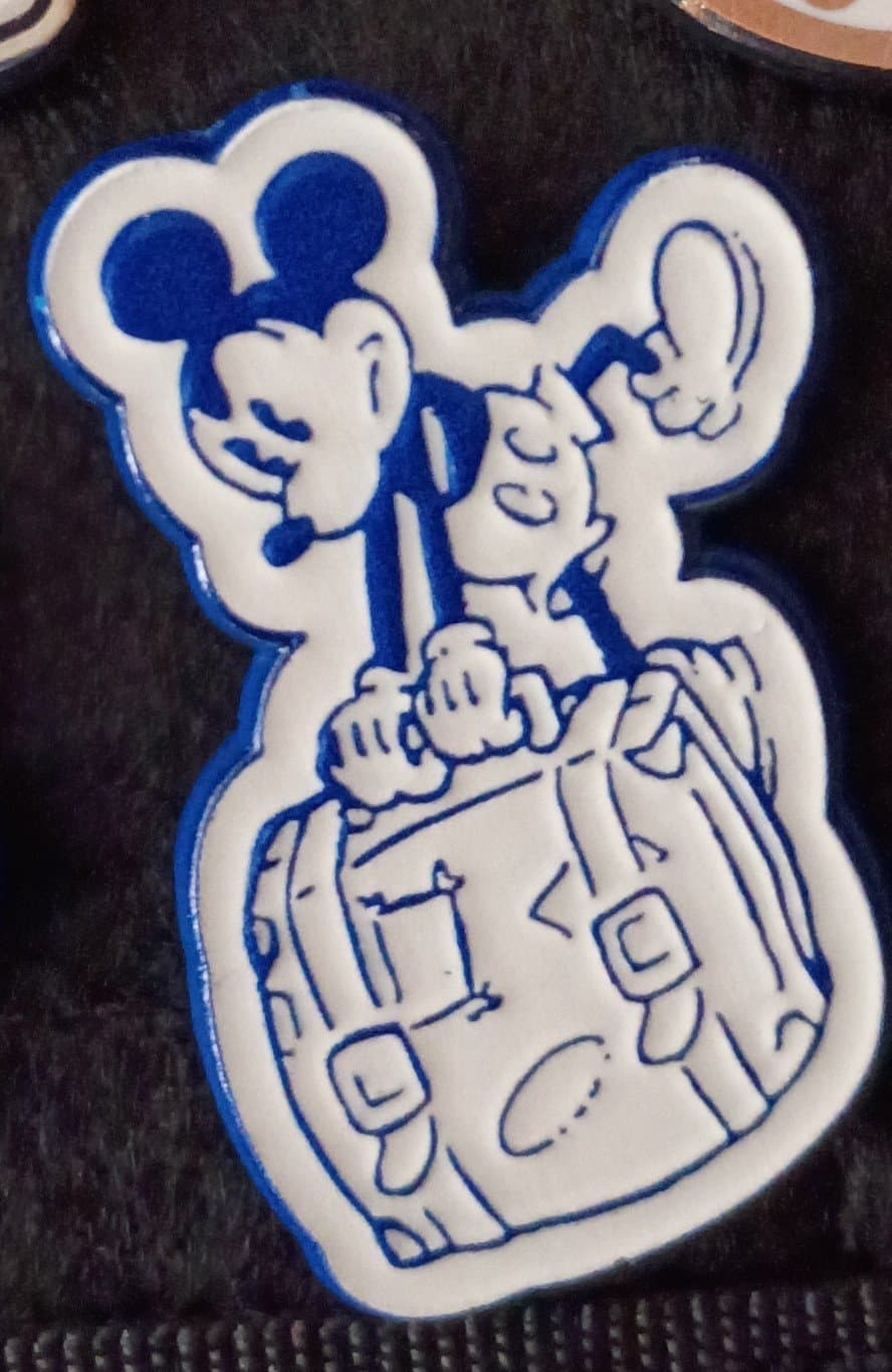 Mickey Pulling Luggage