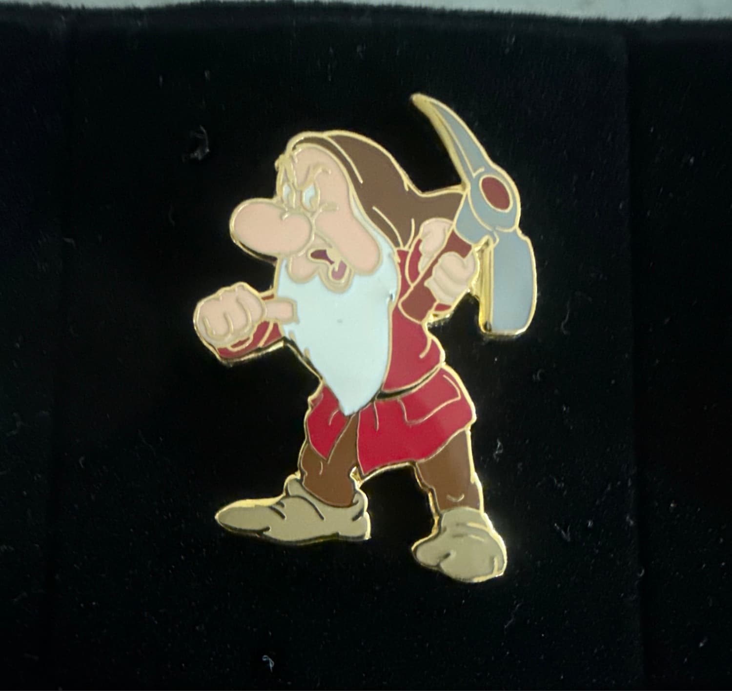 Grumpy Holding a Pick Axe front