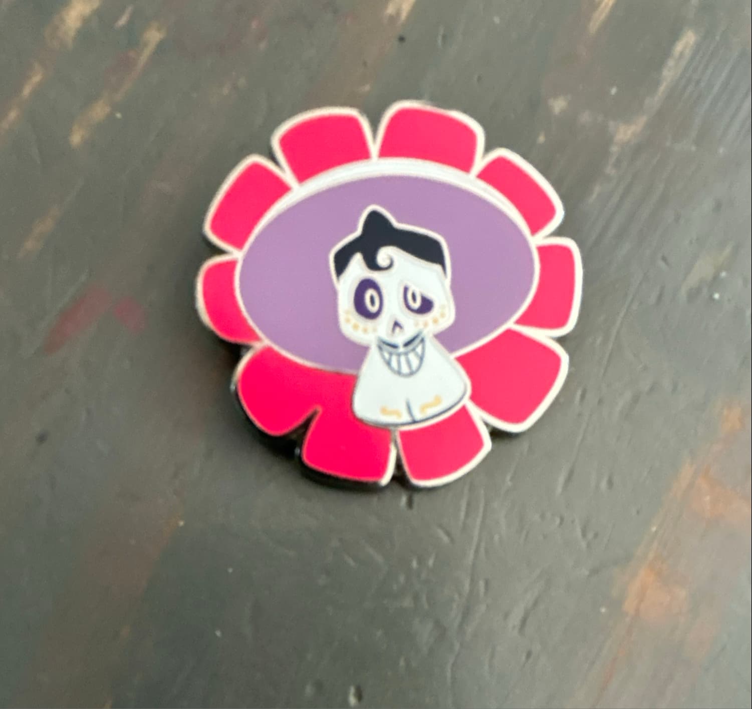 Héctor Framed Marigold Flowers Pin front