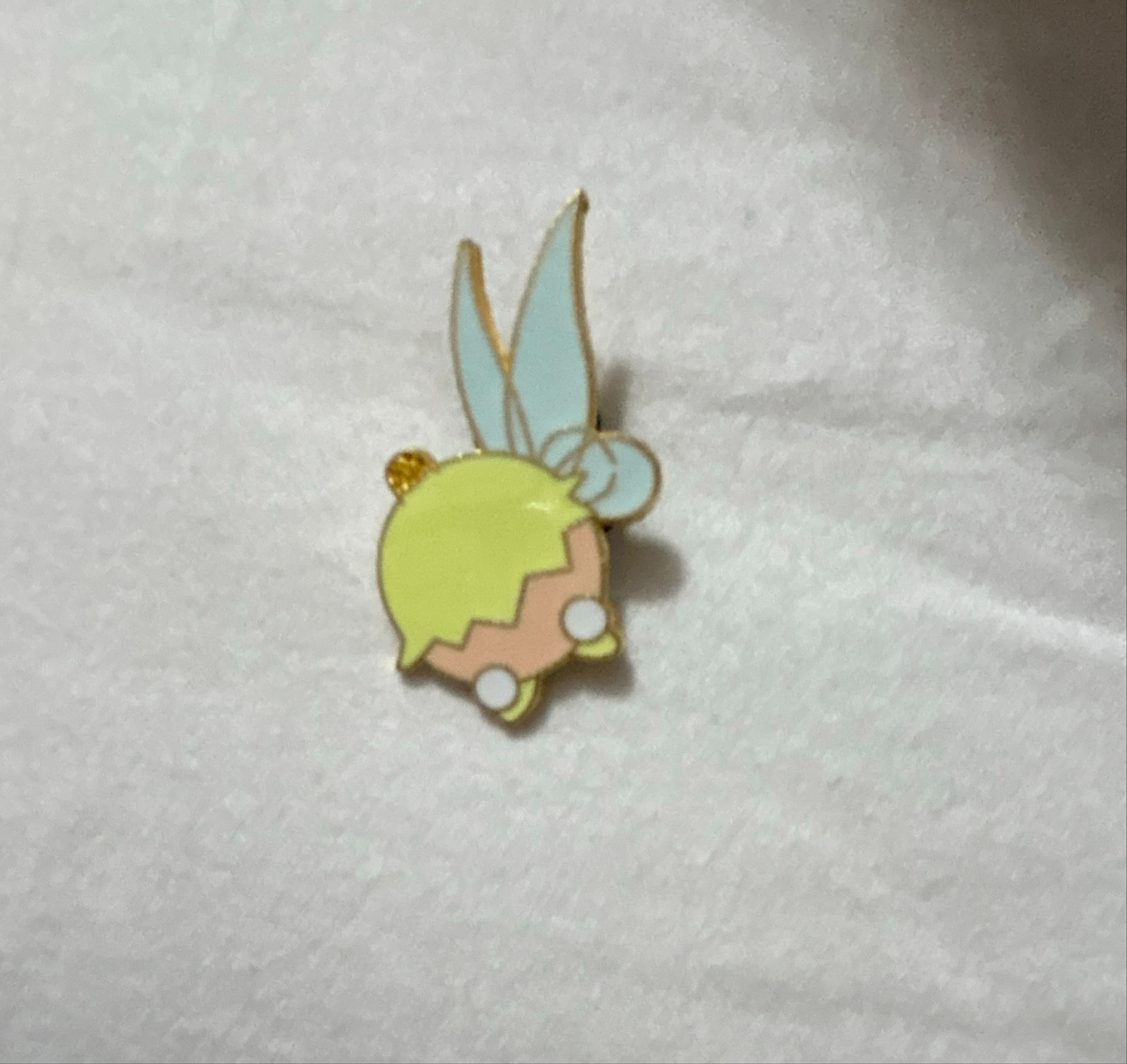 Baby Character Pins (possible) or Cute Stylized Characters Mystery Collection (possible)