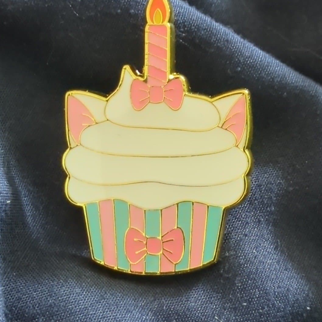 marie cupcake with candle