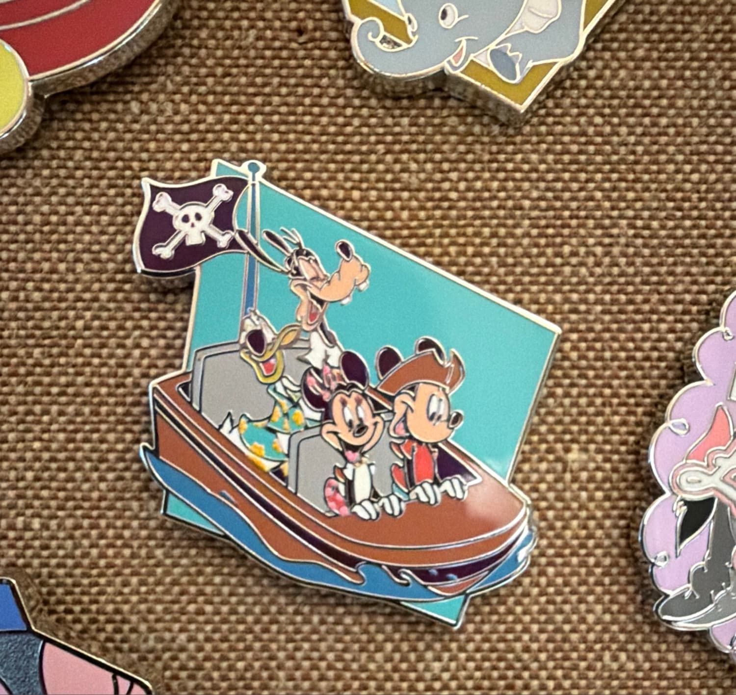 Mickey, Minnie and Goofy Riding Pirates of the Caribbean front
