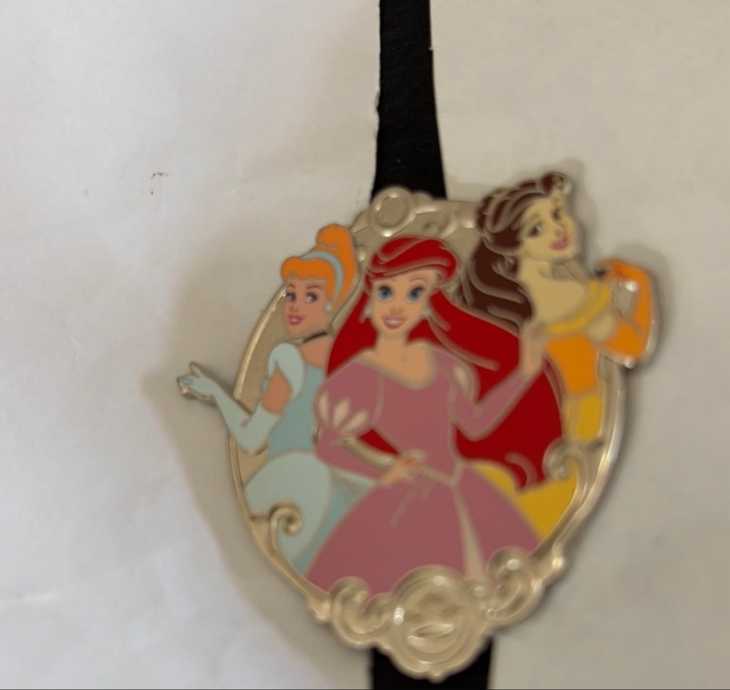 Cinderella, Ariel, and Belle Cluster Pin front