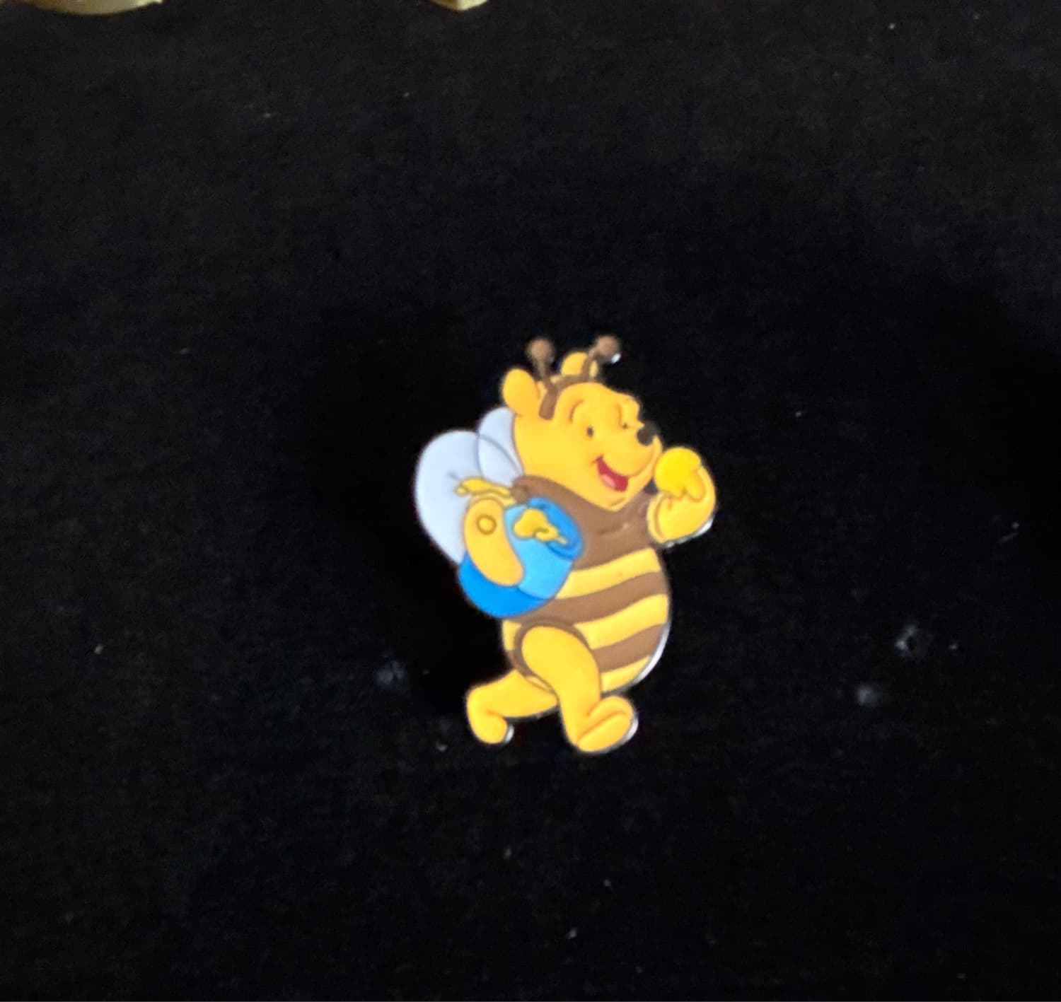 Pooh in Bee costume, Bee, and ''Hunny'' Pot