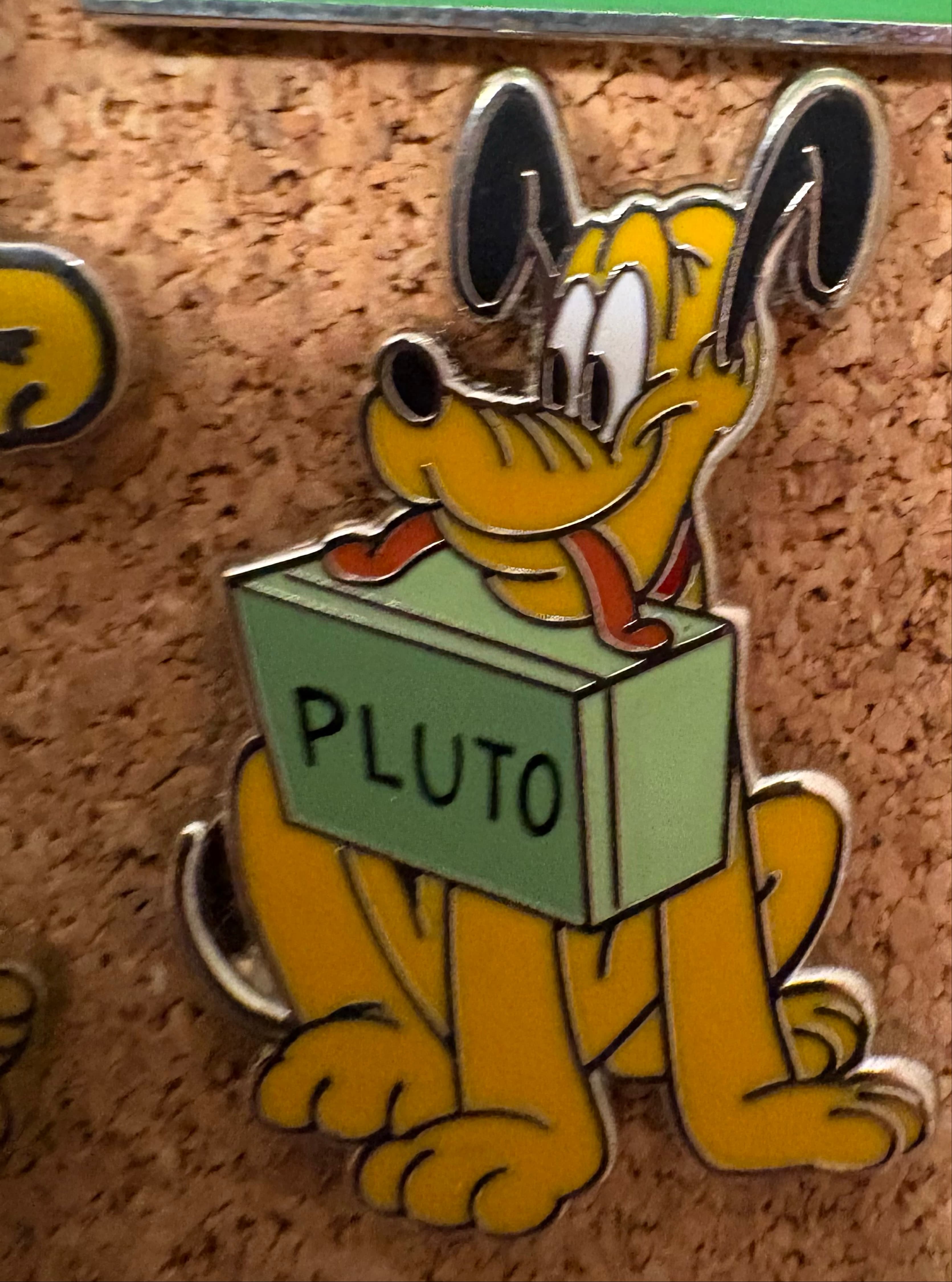 Pluto Holding Green Box with Name