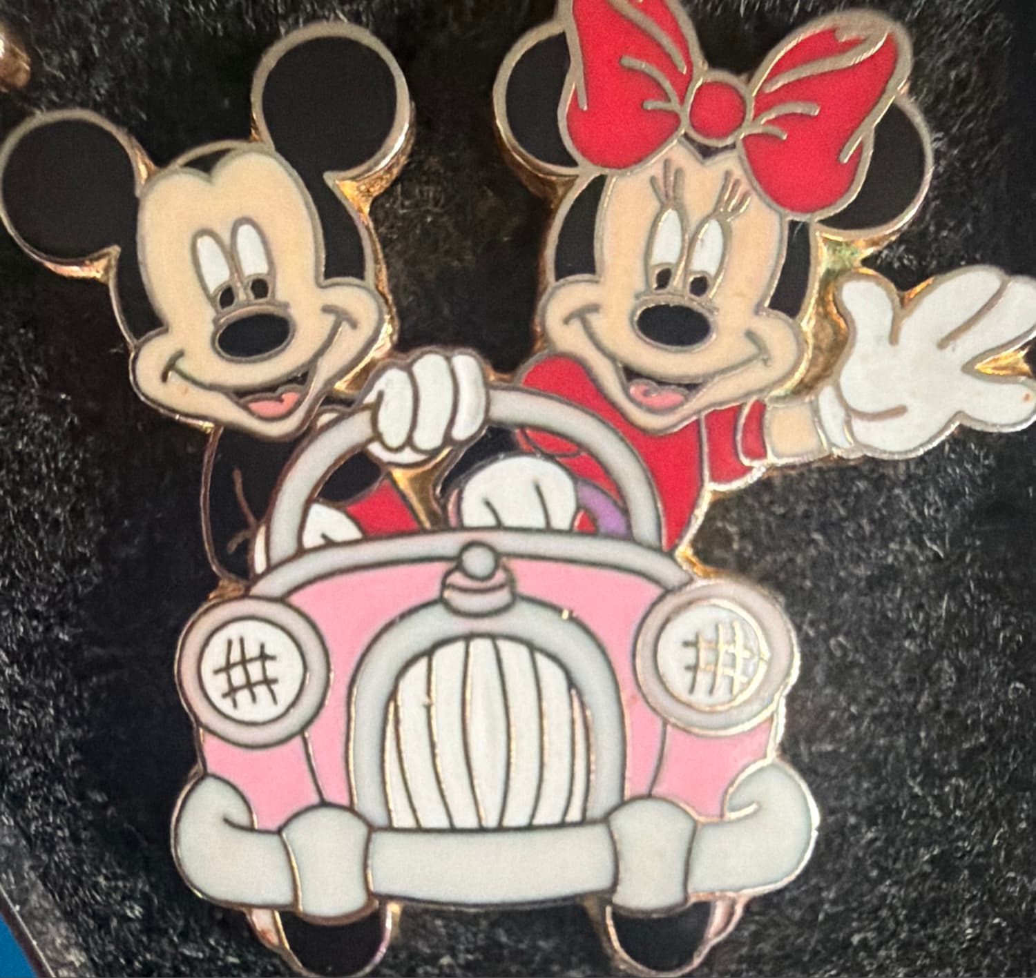 Mickey and Minnie in a Pink Car front