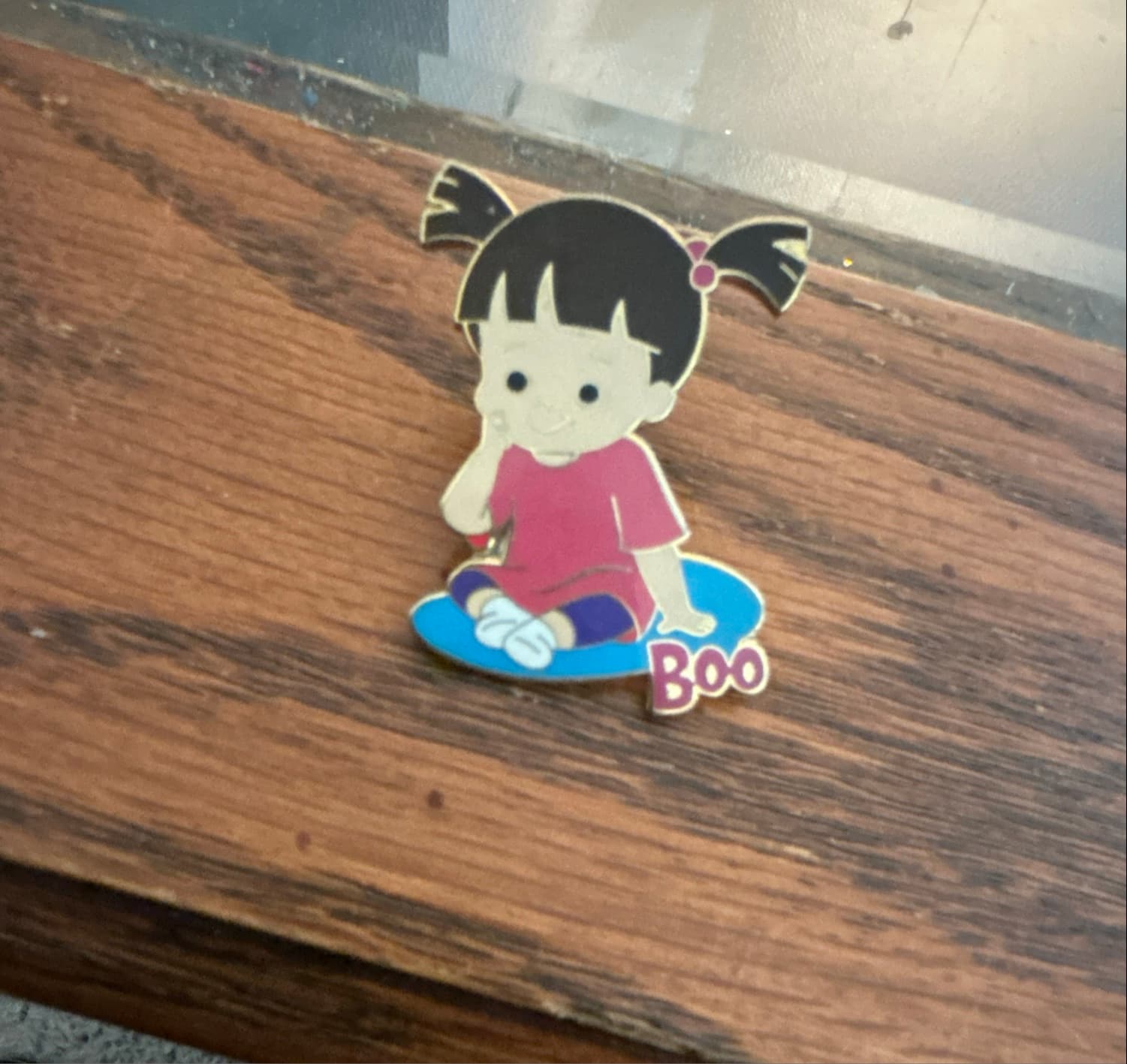 Boo Sitting on Blue Mat with Name - Monsters, Inc.