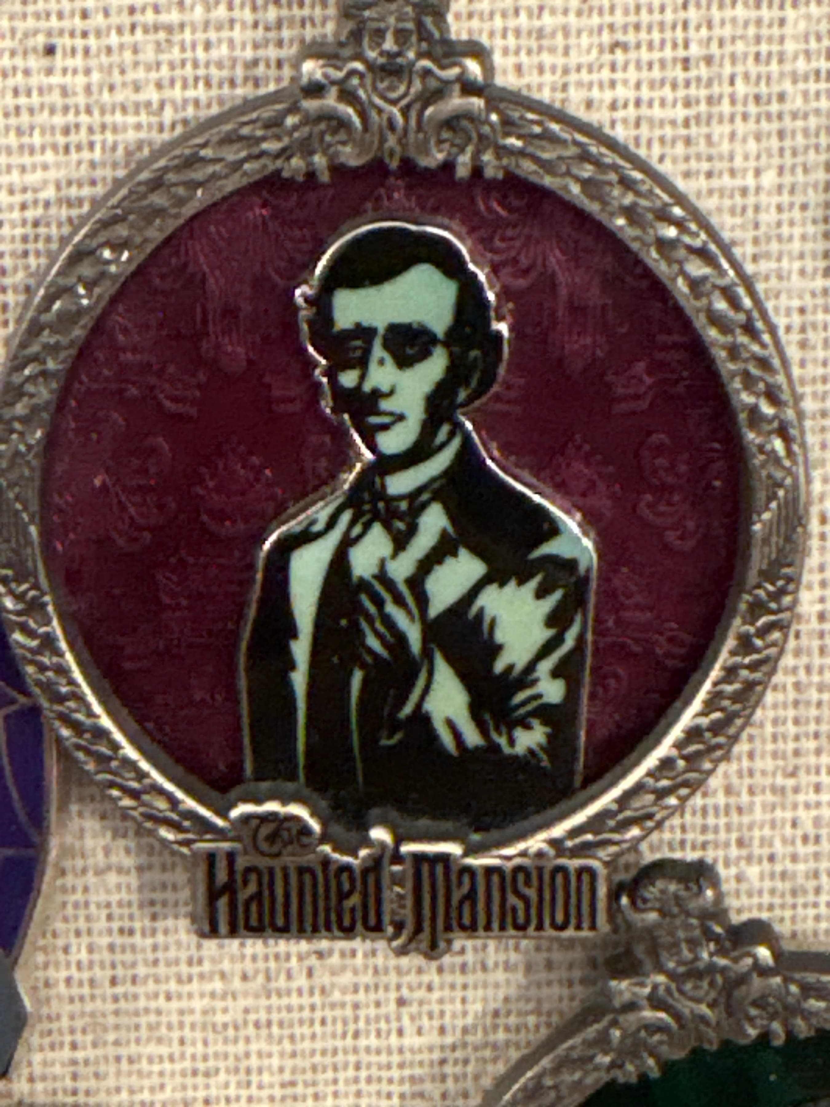 Haunted Mansion Circular Plaque Frames - The Aging Man - White Glove Haunted Mansion Series front