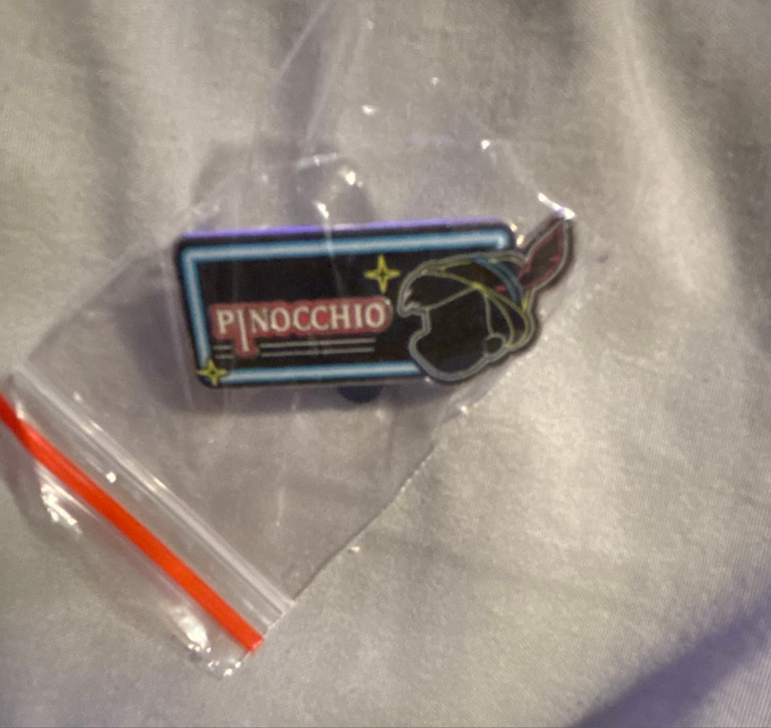 Pinocchio - Hong Kong Disneyland Neon Name Sign Game Pin front