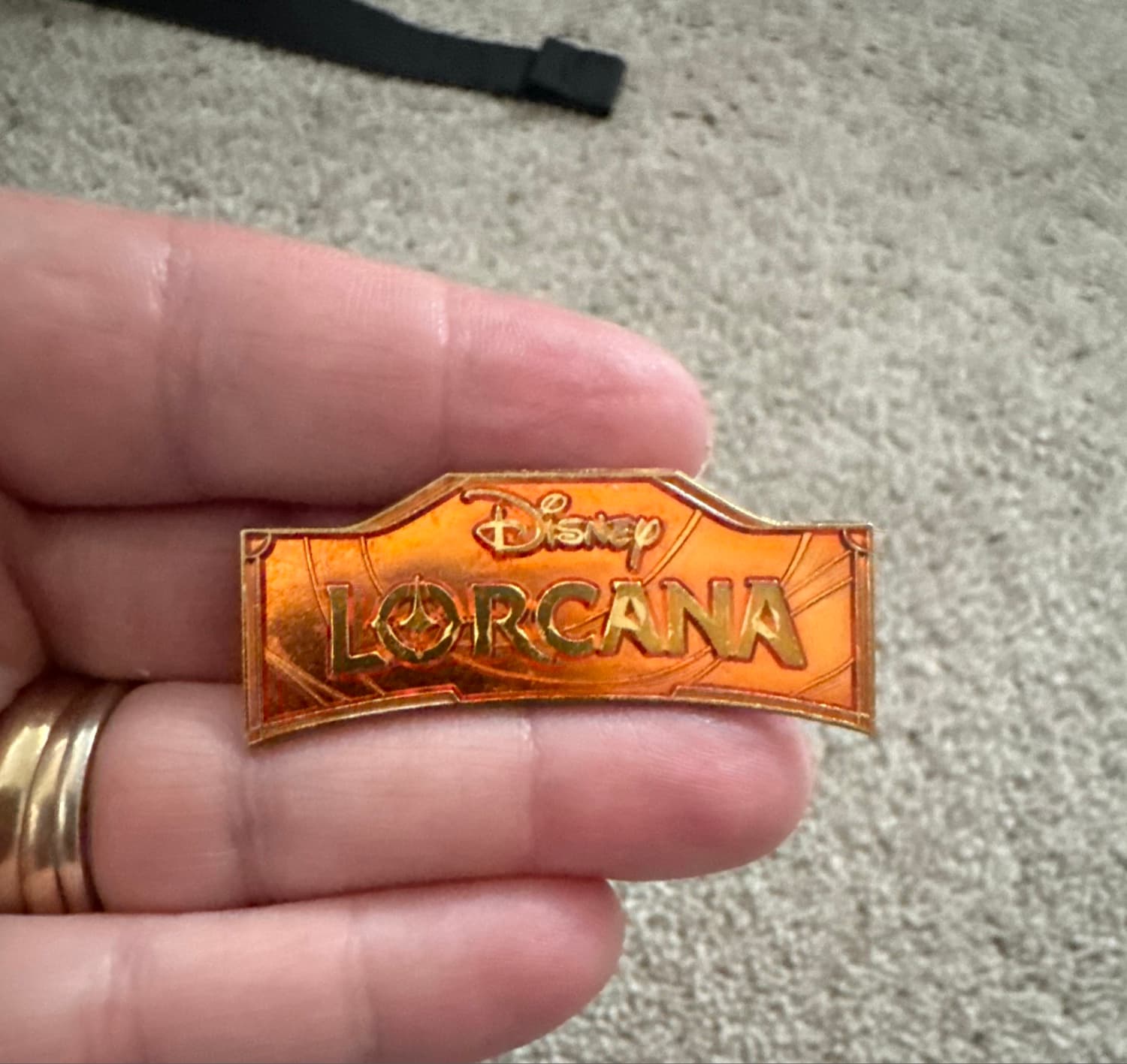 Disney Lorcana Logo Pin - Orange front