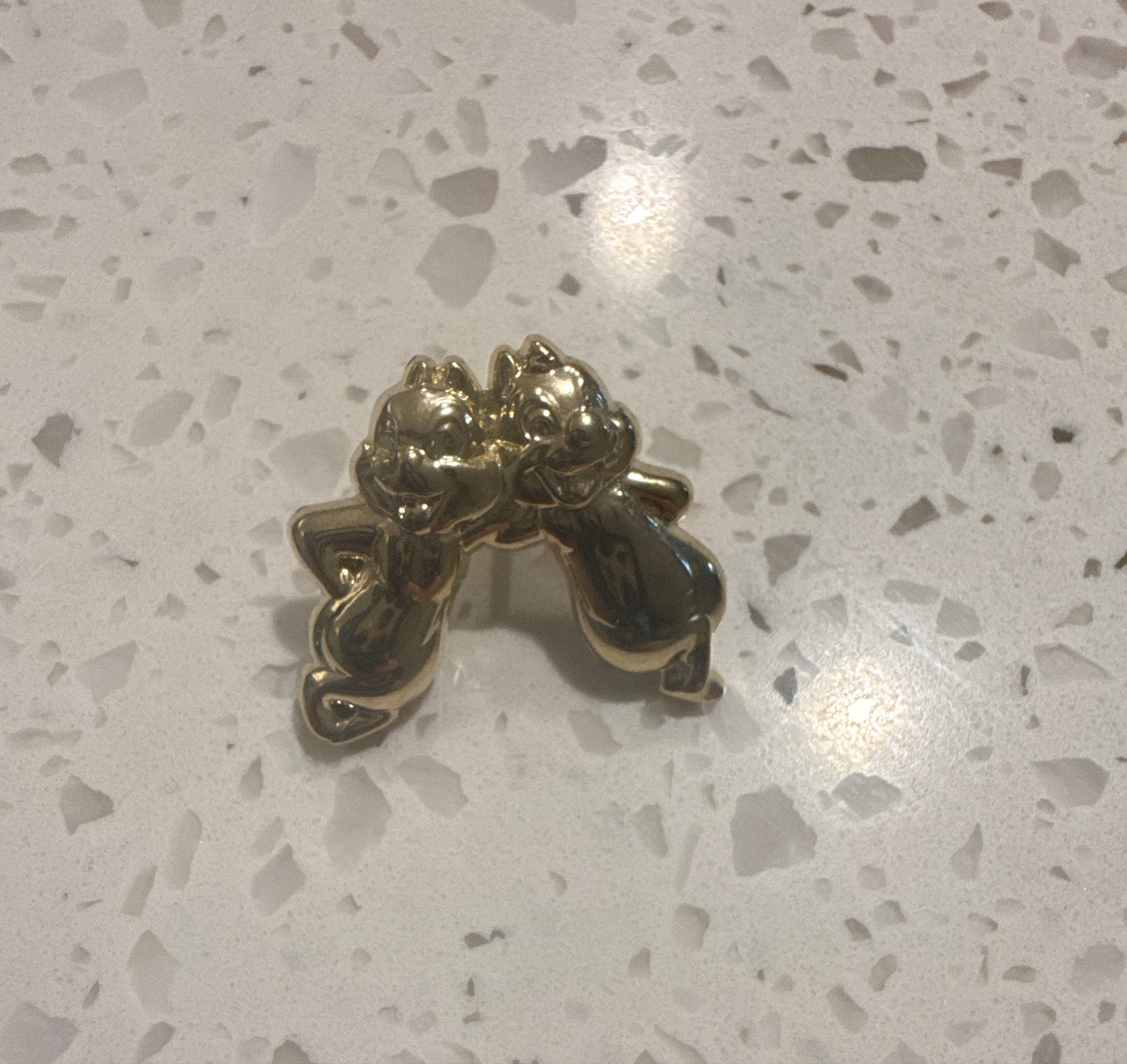 Chip and Dale 50th gold statue front